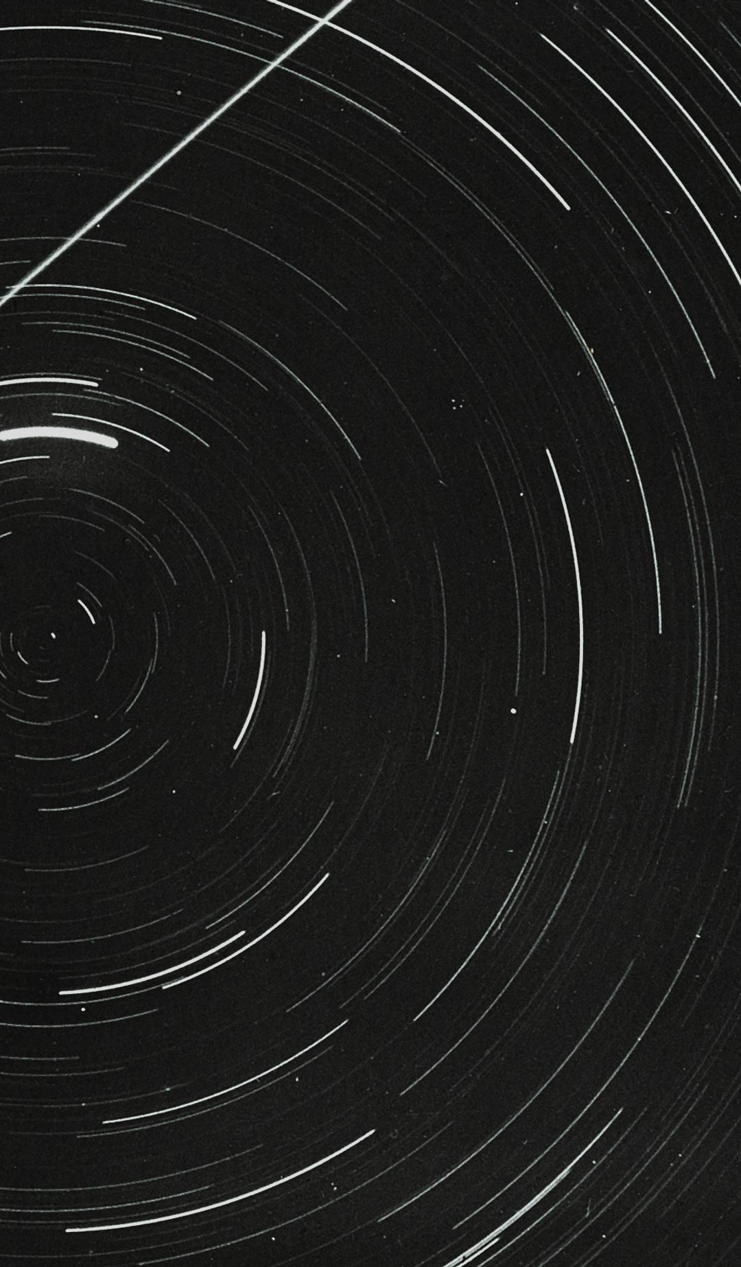 Lantern slide of meteor and star trails.
