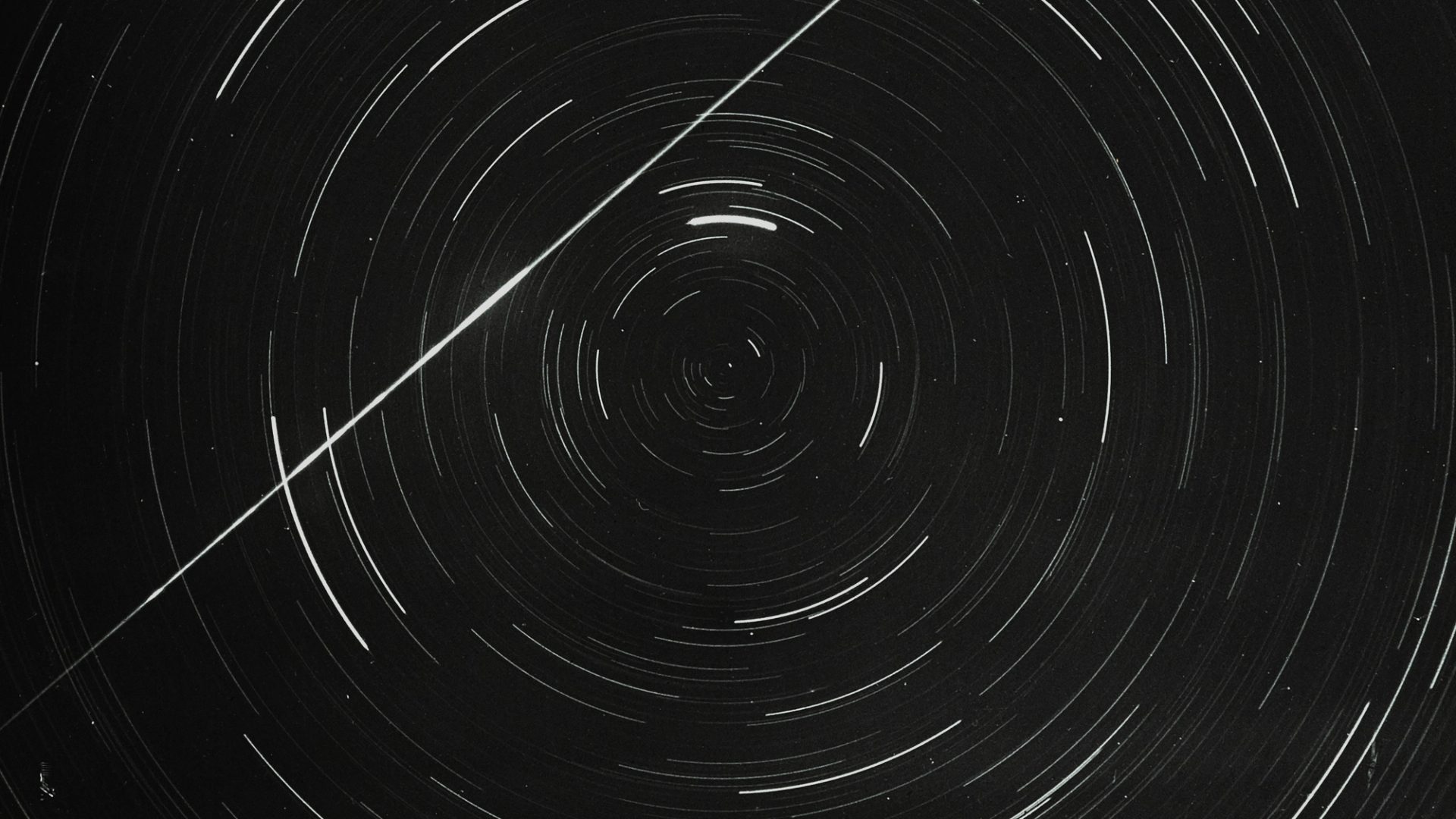 Lantern slide of meteor and star trails.