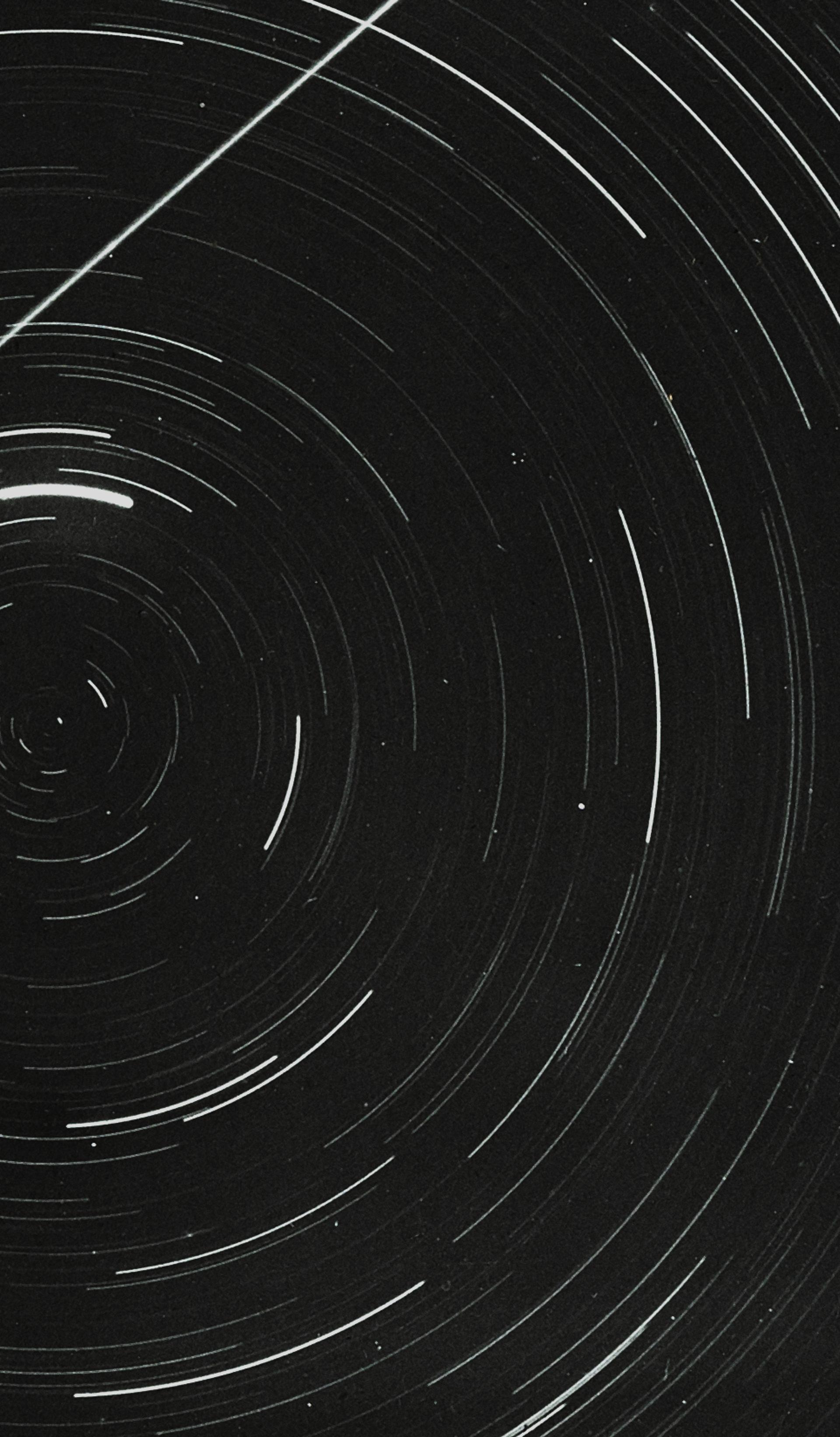Lantern slide of meteor and star trails.