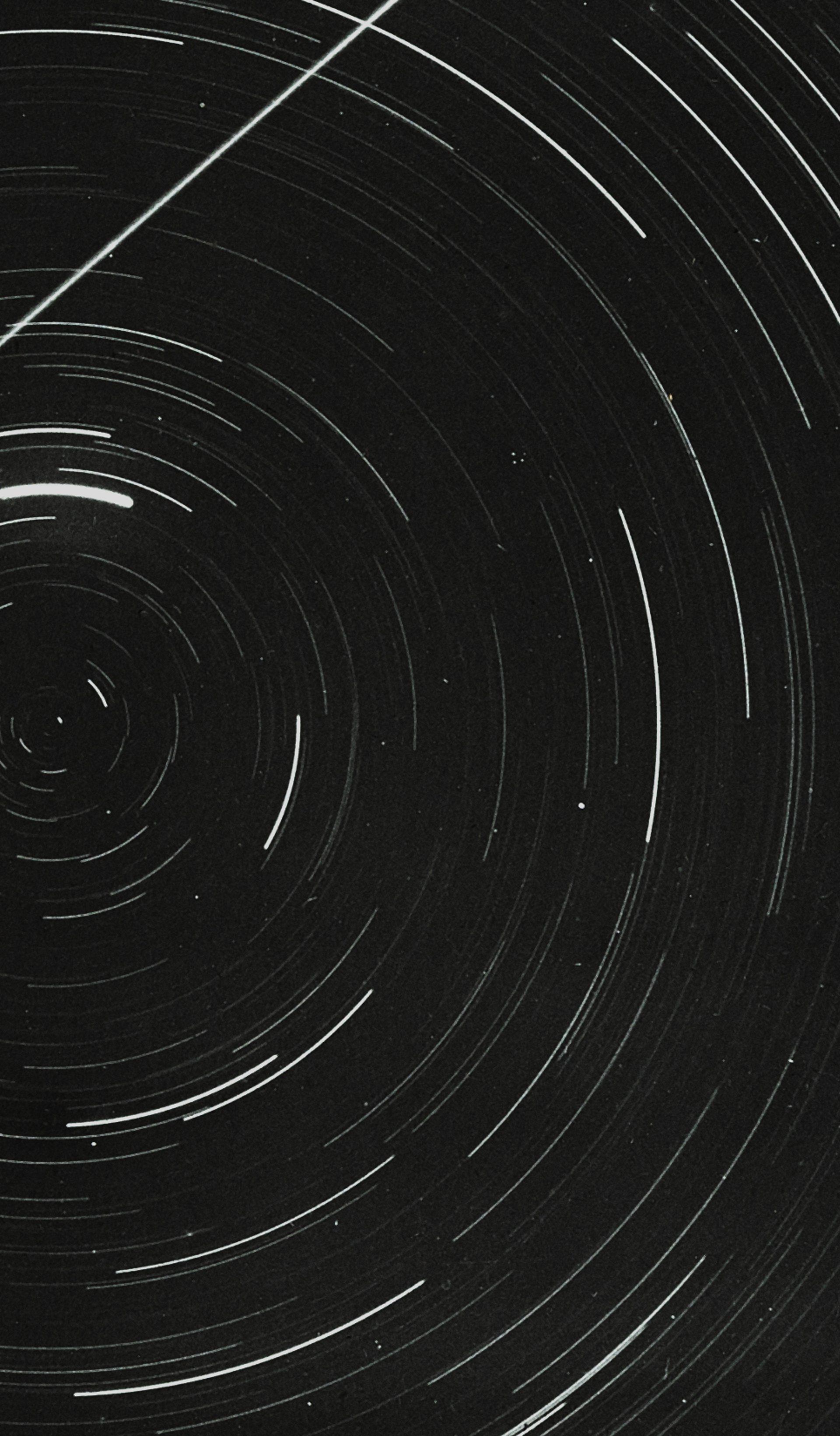 Lantern slide of meteor and star trails.