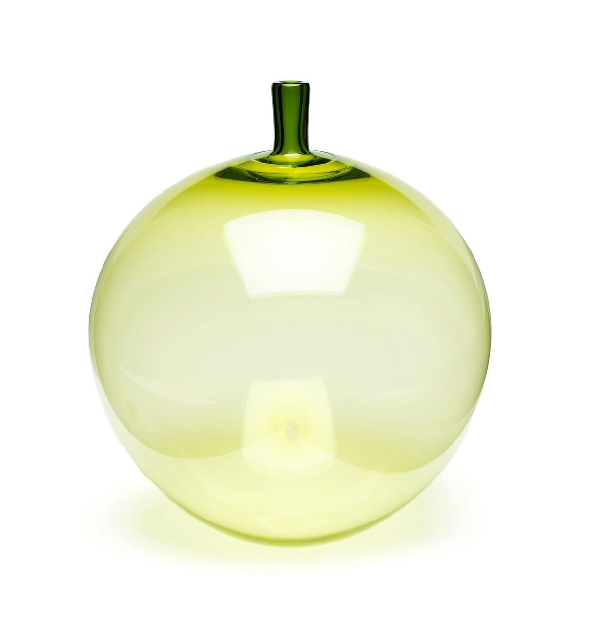 A green, glass blown, apple-shaped vase.