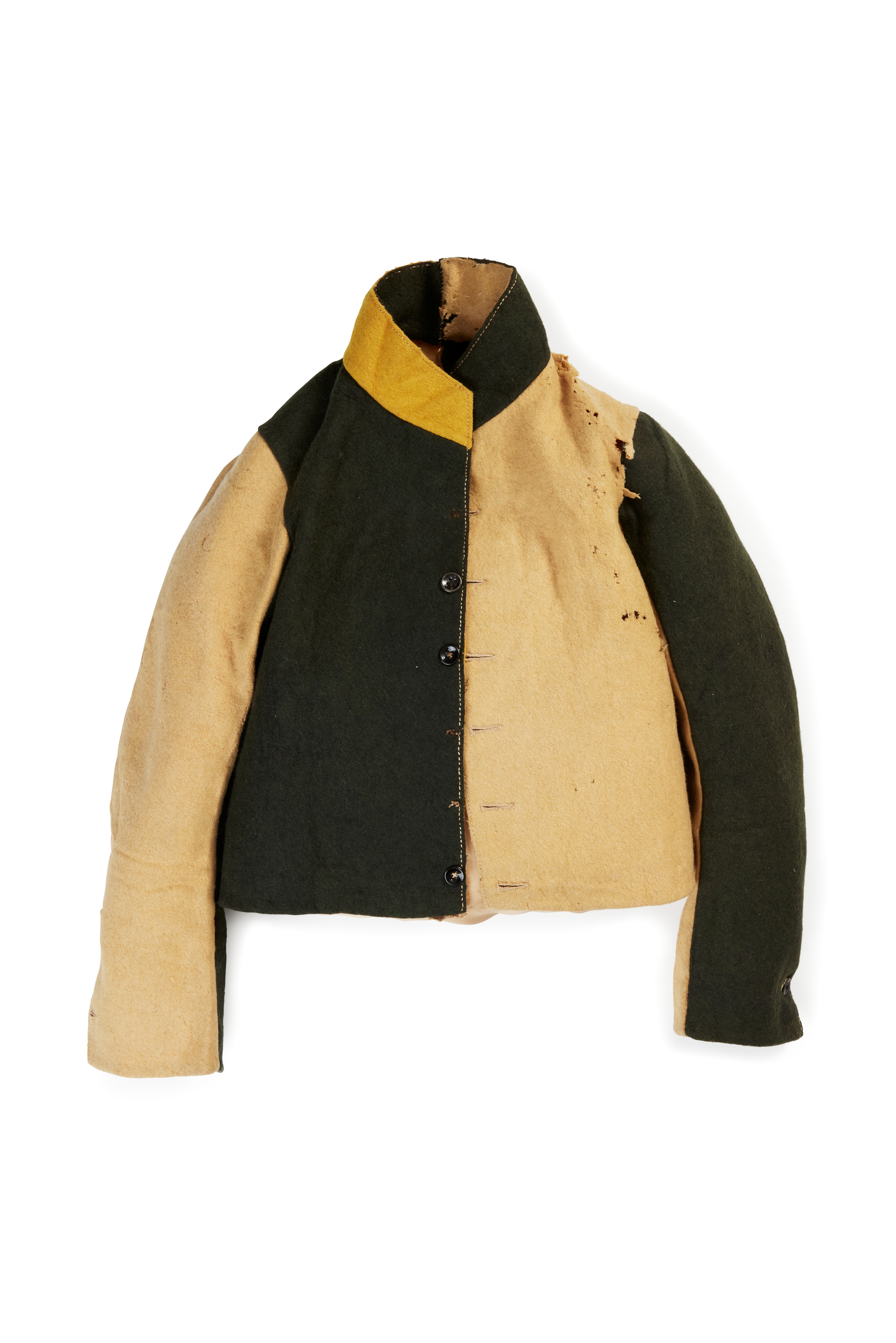 Convict jacket of black and yellow felted wool. The jacket is short with front buttoning (of the original six metal painted black buttons, three are missing), a high stand-up collar, and a long, shaped sleeve with buttoned cuff. The torso, sleeve and collar are all particoloured and hand-stitched with linen thread. The inside right front is stamped in ink with the letters 'WD'.