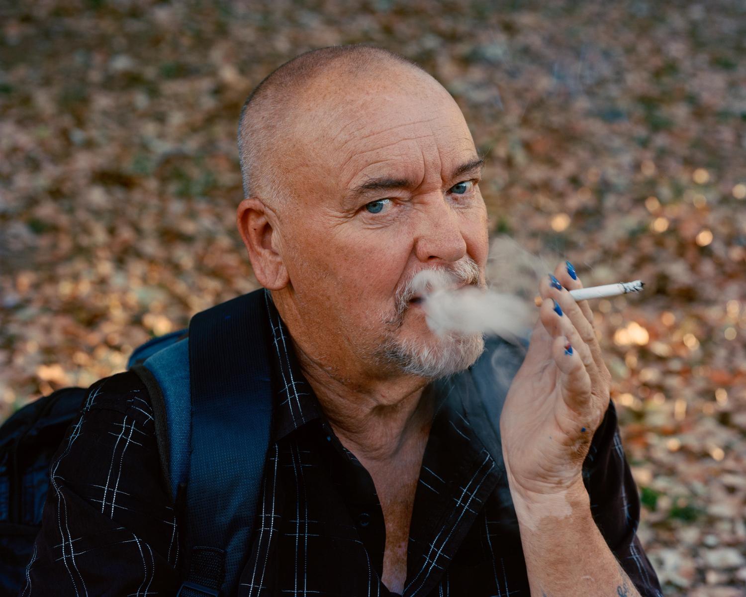 Andy smoking his fourth cigarette, Parramatta, 2023.