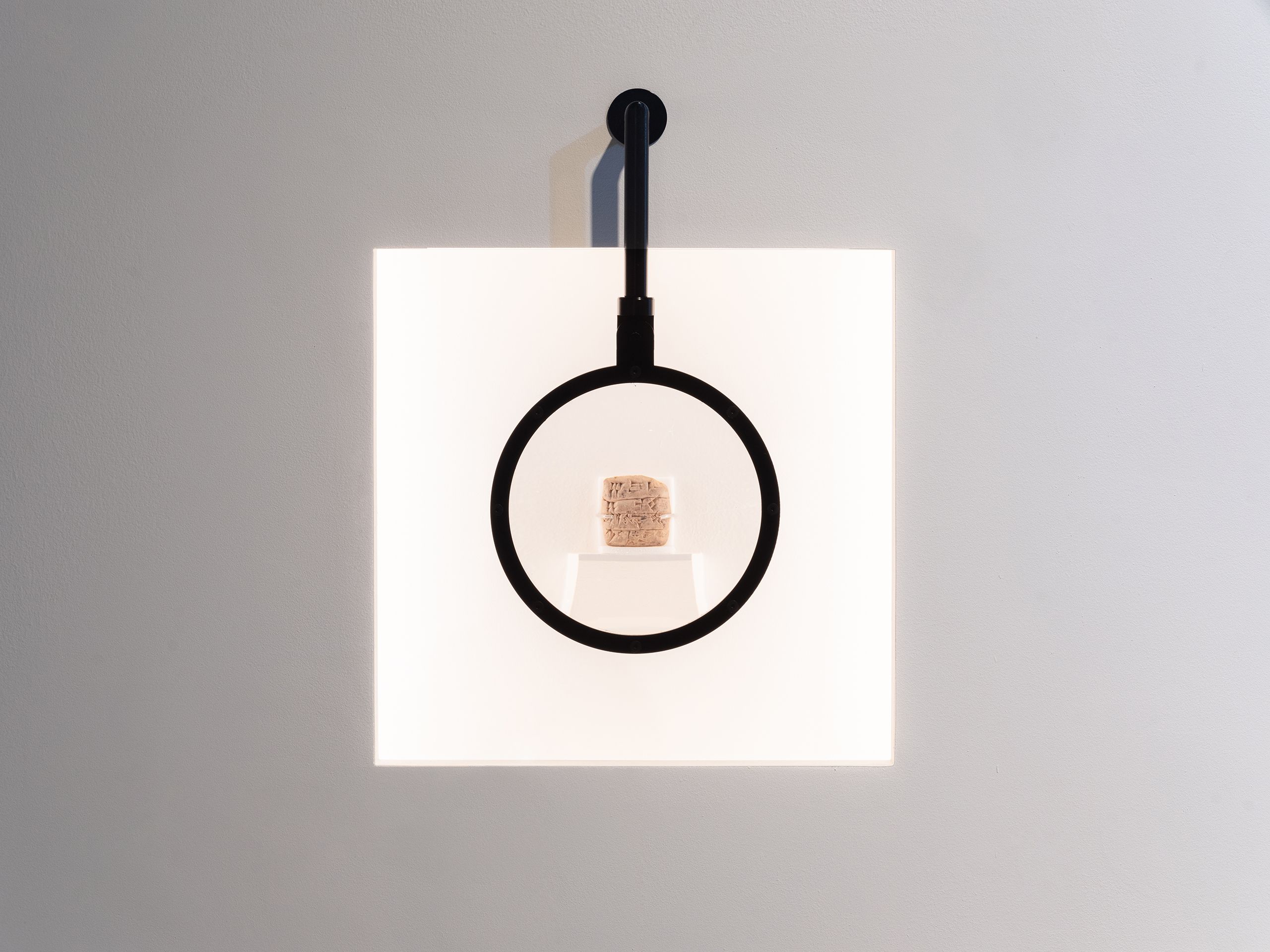 Terracotta Tablet on display under magnification