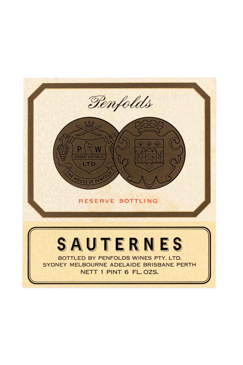 A paper wine label with bronze border and bronze Penfolds logo in the centre.