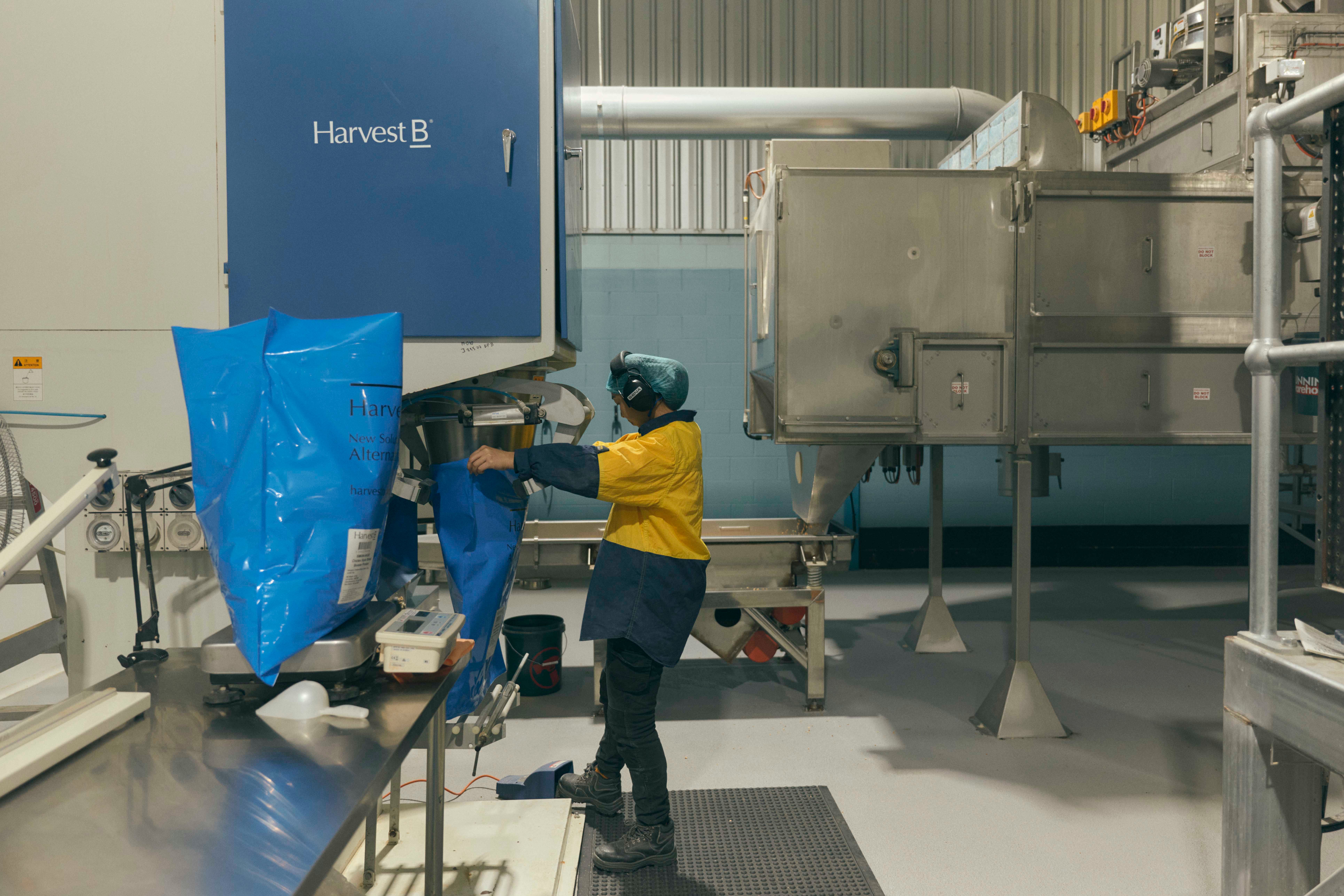 Machine worker in a factory.
