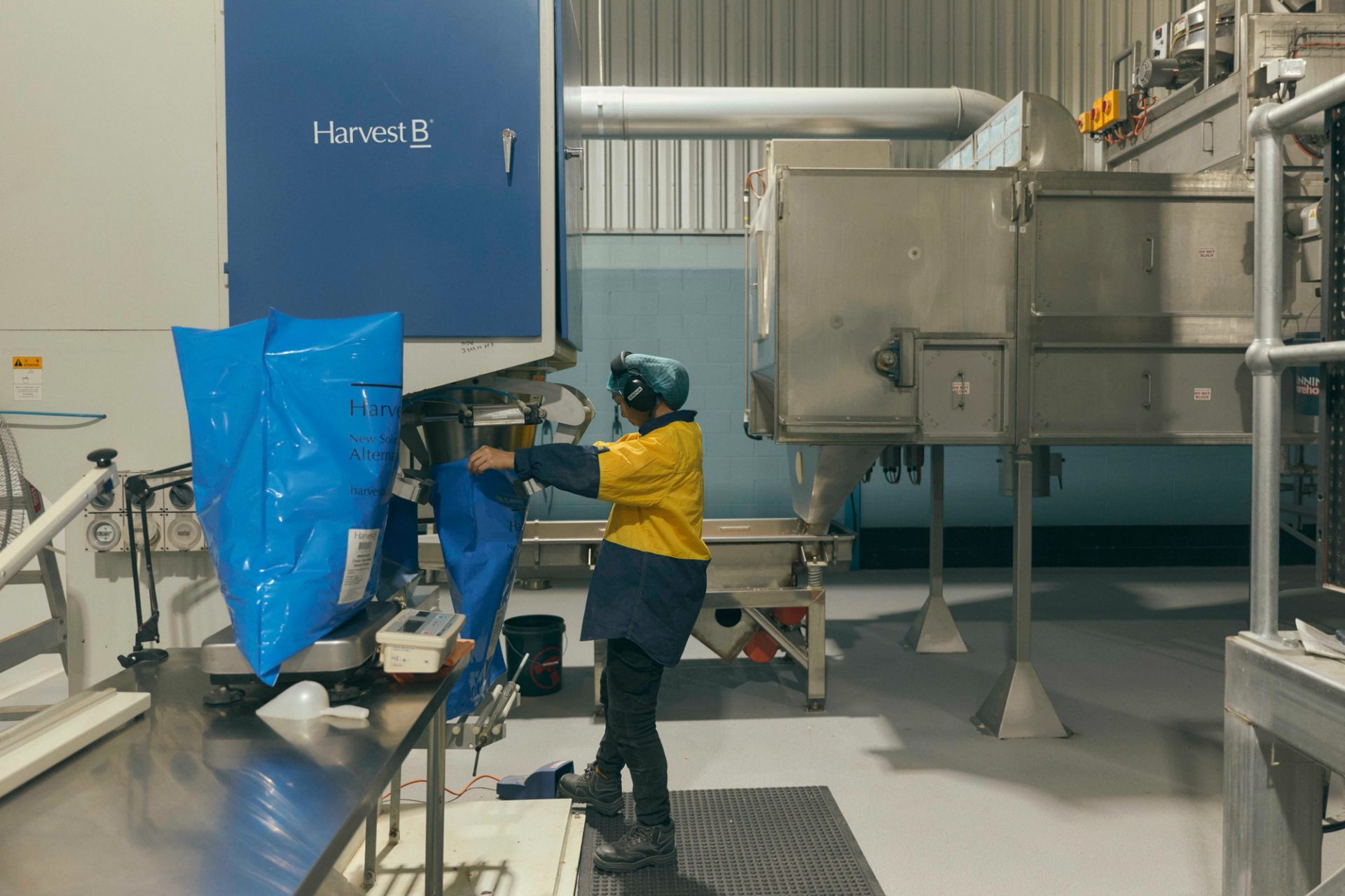 Machine worker in a factory.