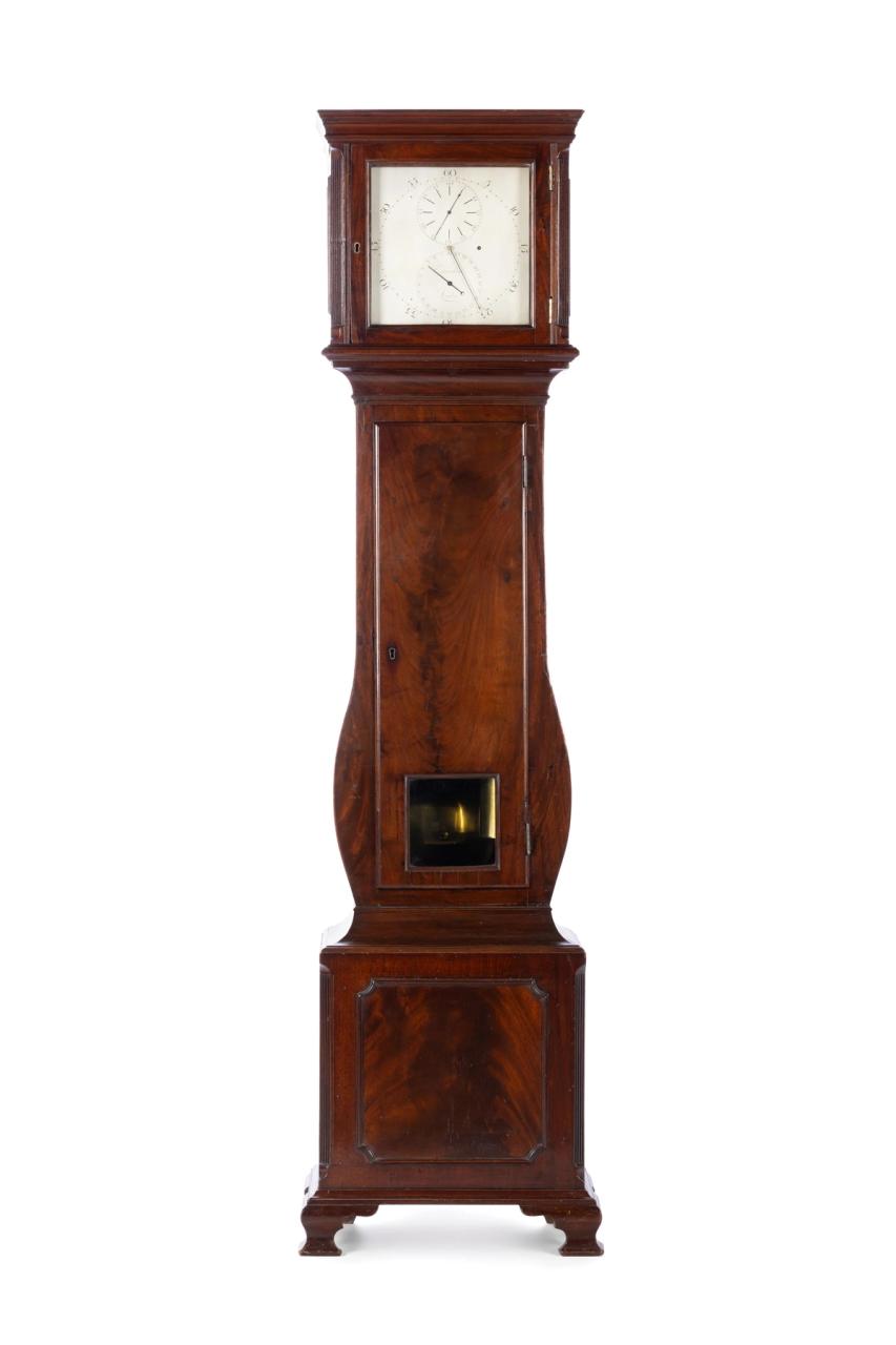 Long case clock made out of wood.
