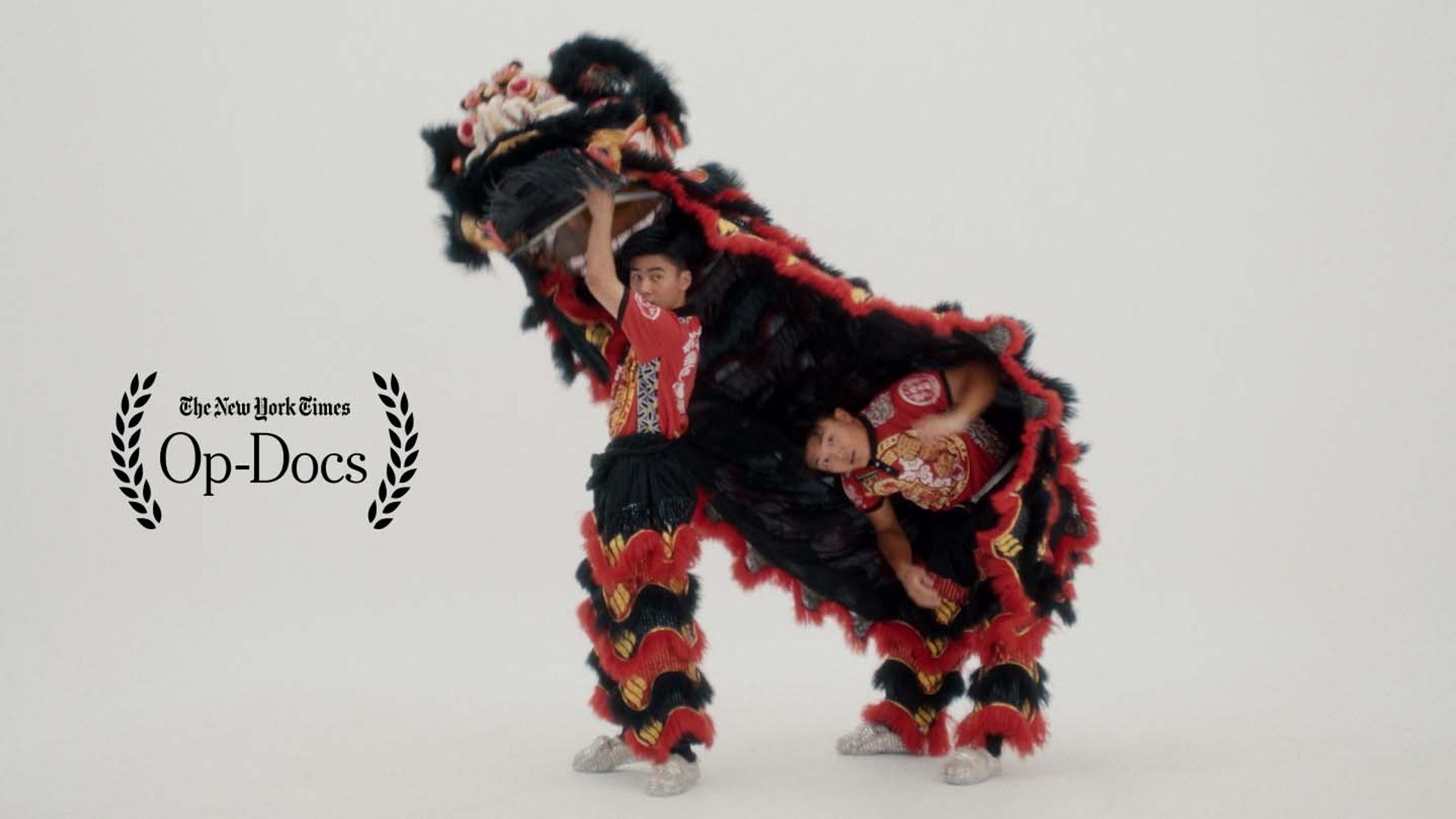 two mean move from under a lion costume