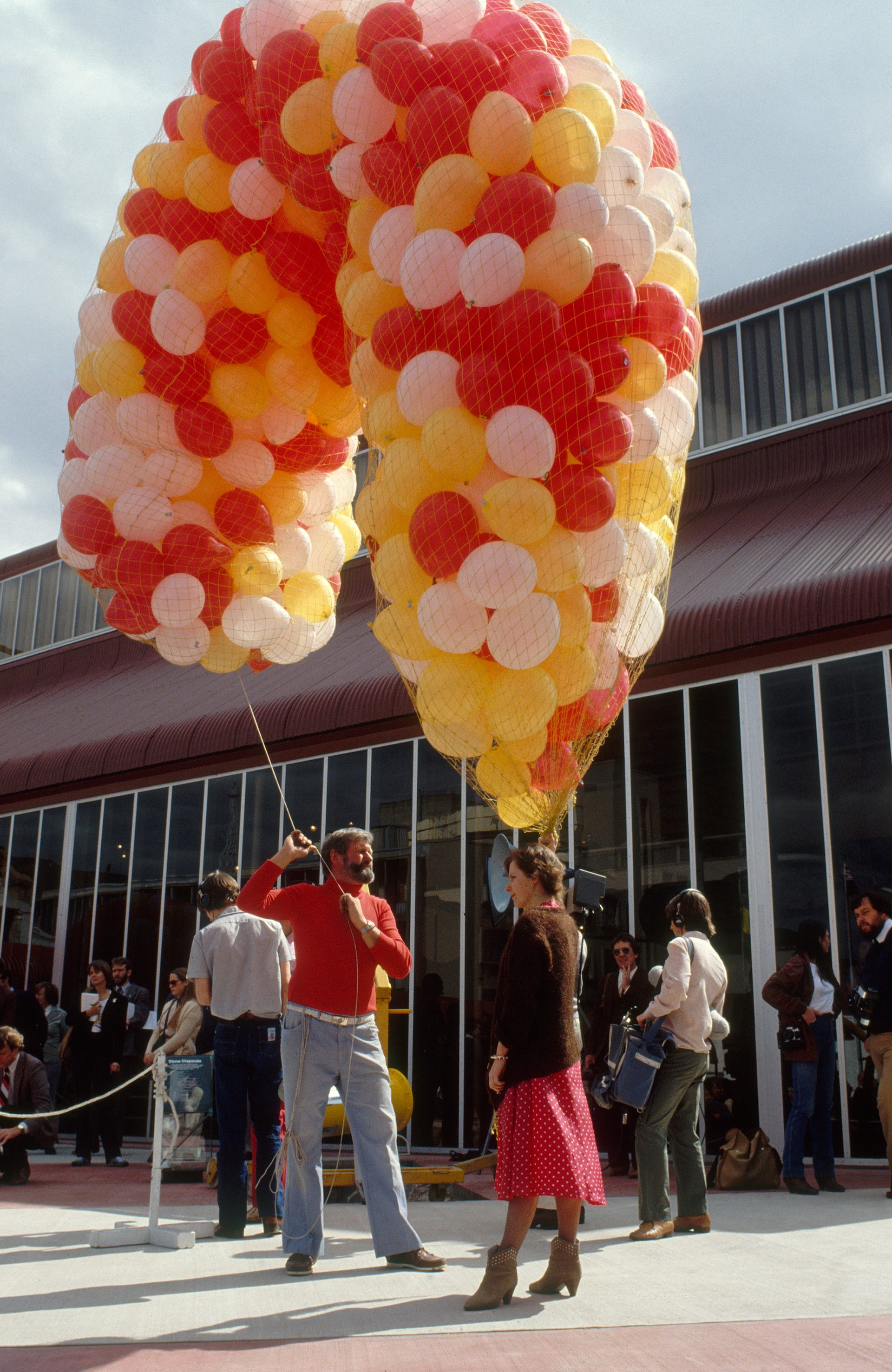 Colour photograph of balloons about to be let off
