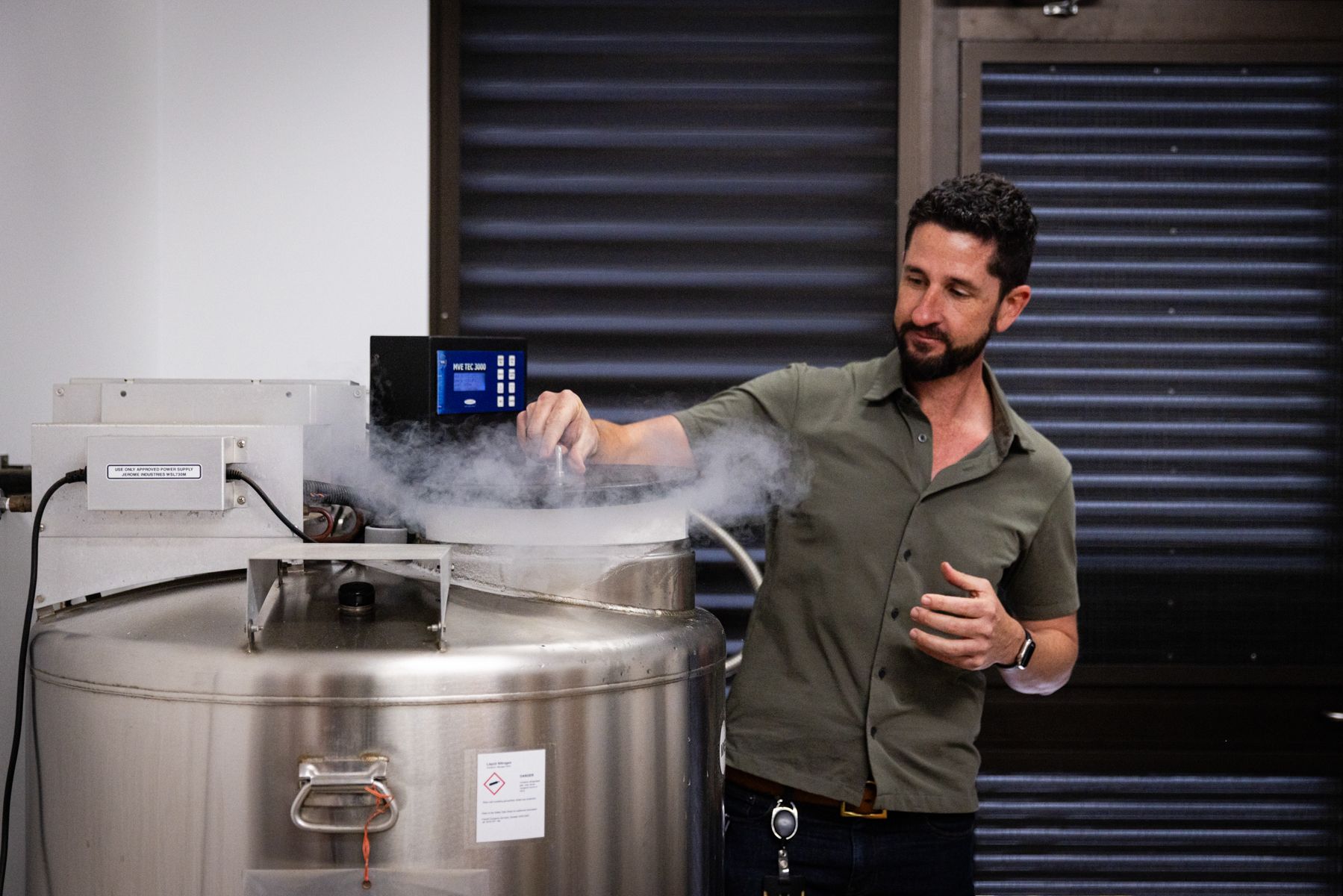 Person opening device at Australian PlantBank Tour
