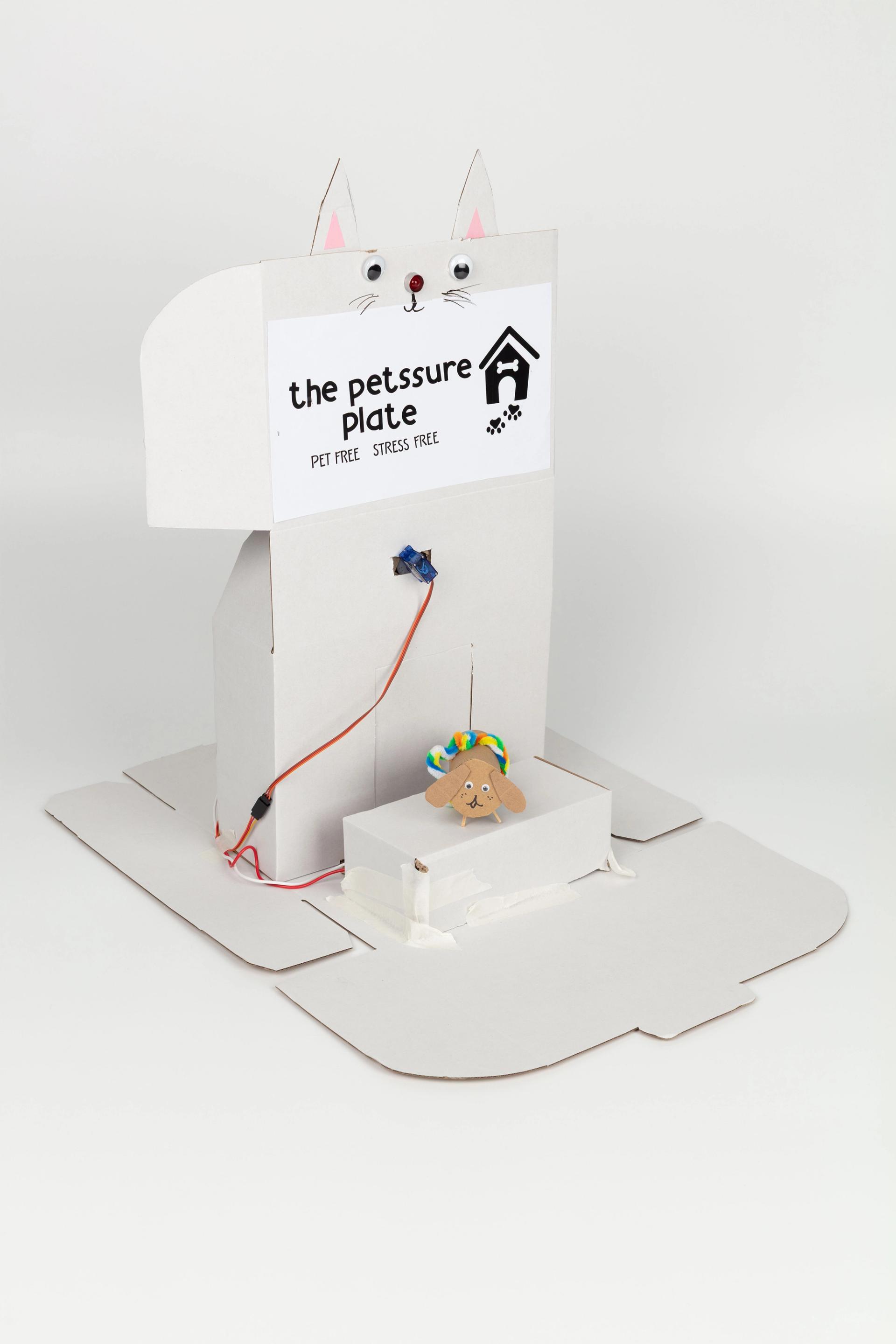 Image of a hand crafted mechanical device against a white background.