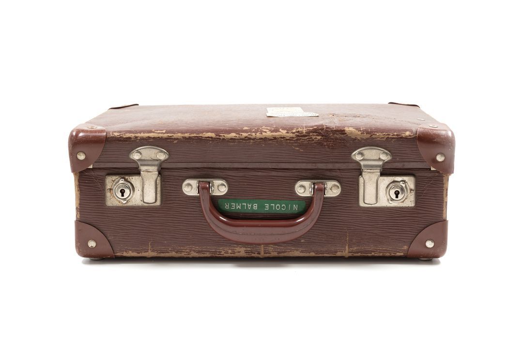 brown leather-looking briefcase with silver clips