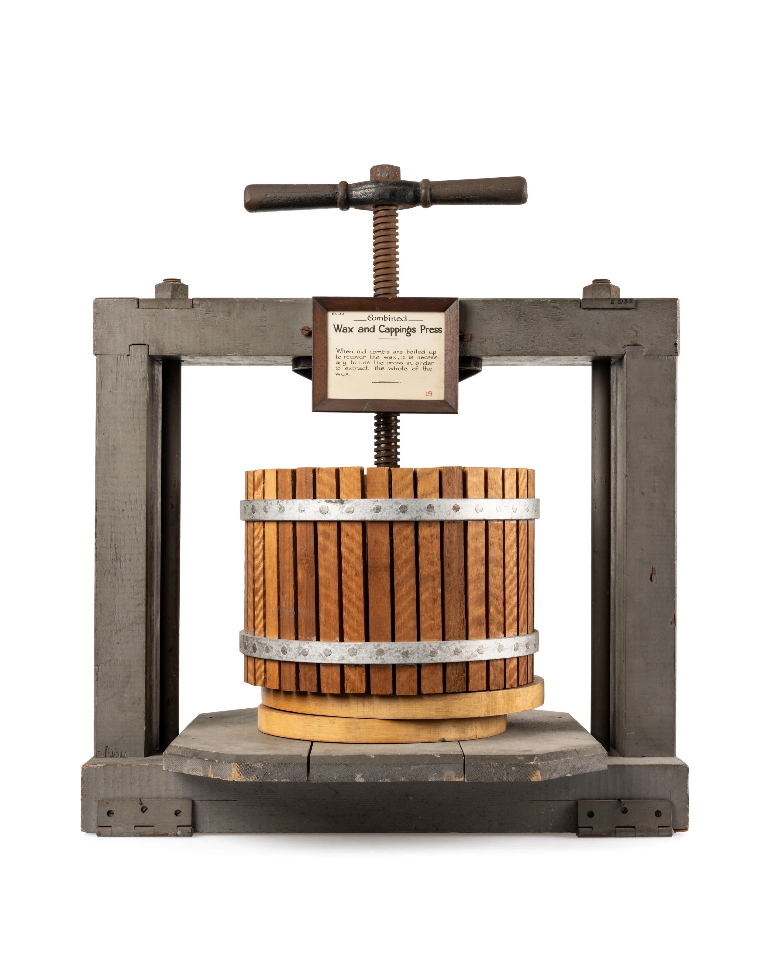 Beekeeping equipment, combined wax and cappings press, made of timber and metal.