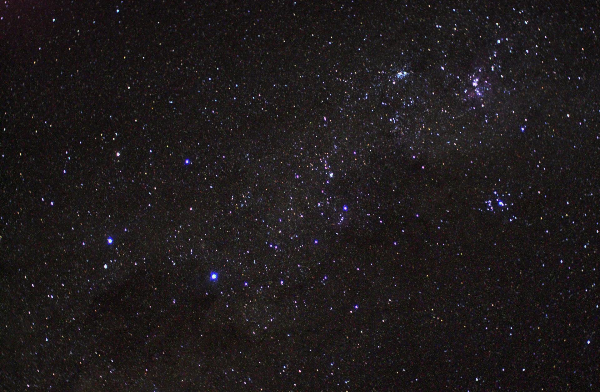 Purple coloured stars in space.