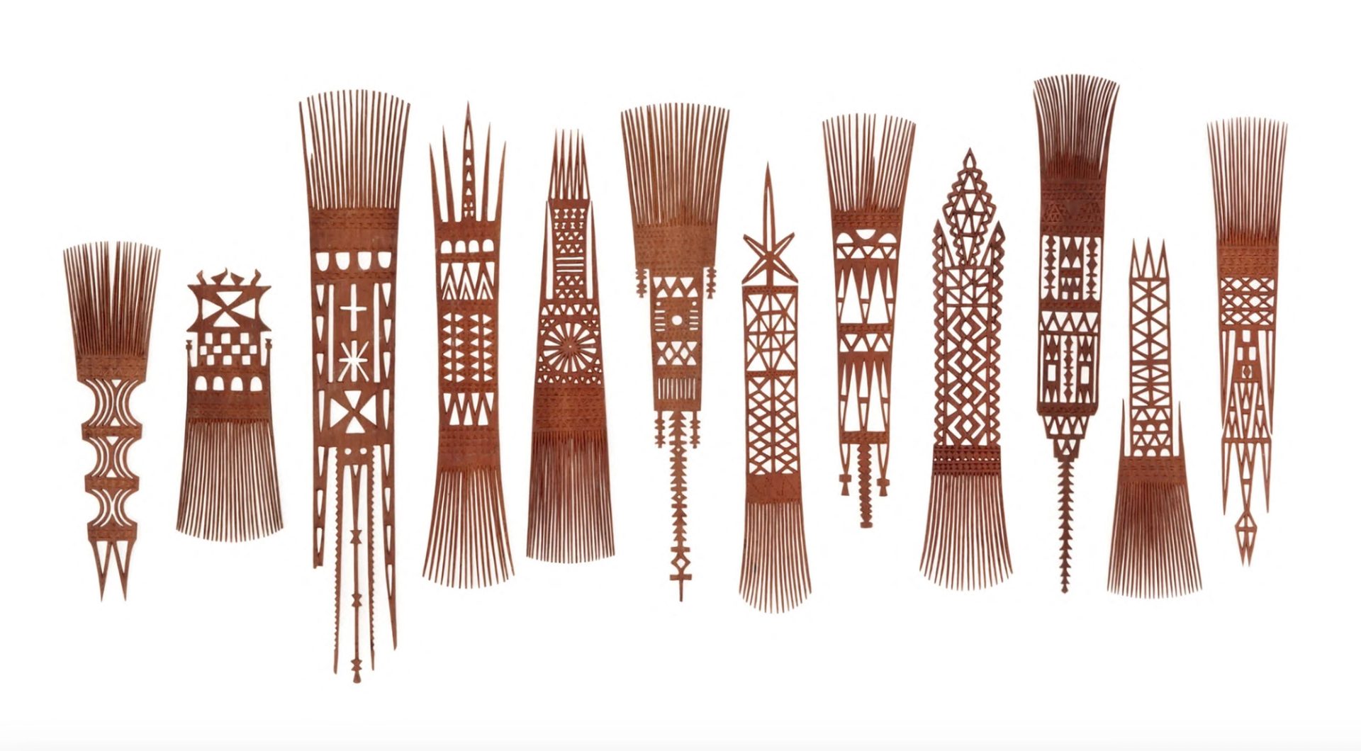 Twelve wooden combs.