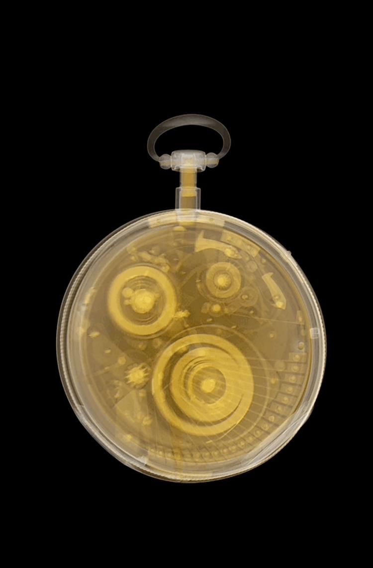A transparent yellow neutron imaging scan of a pocket watch.