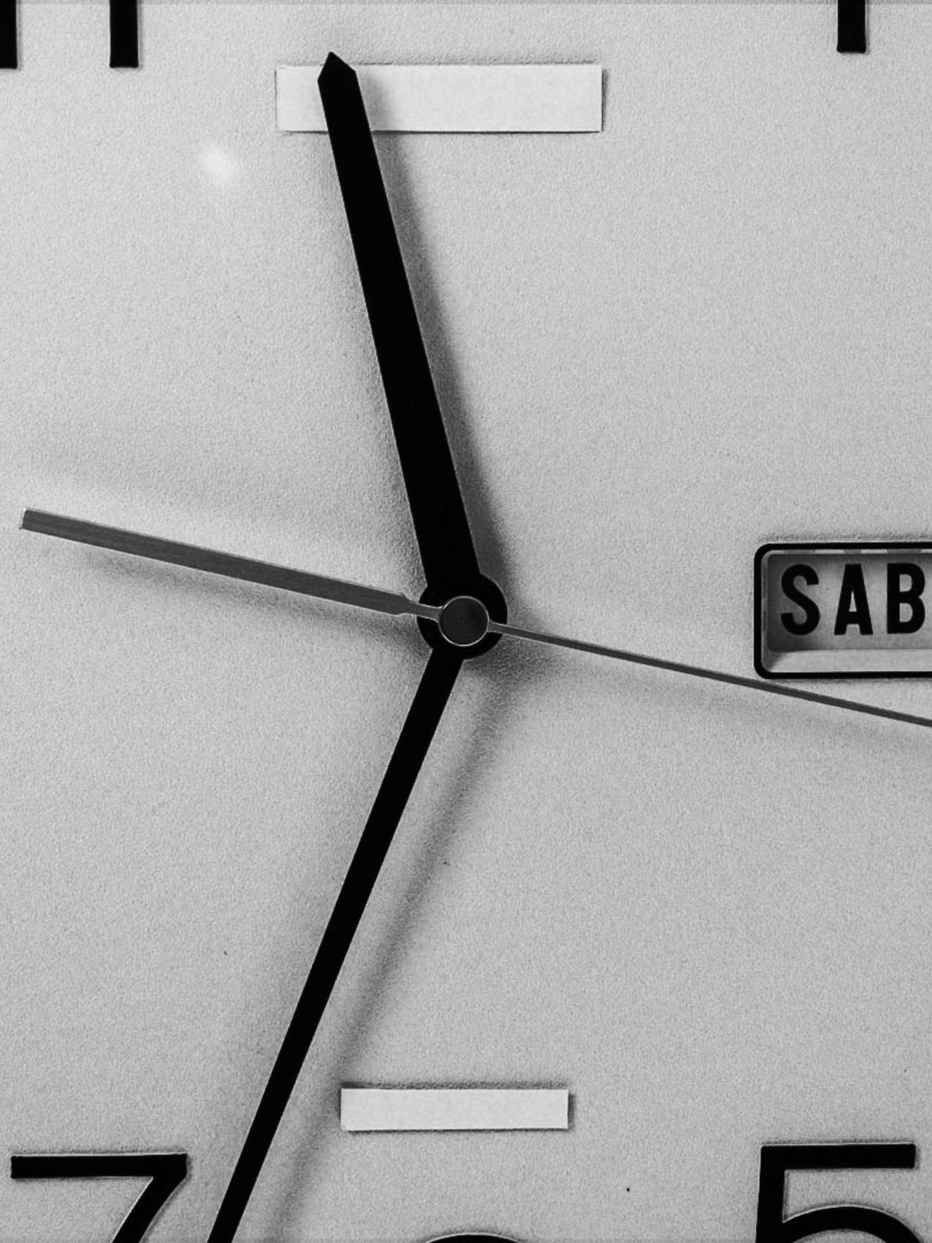 A close up of a clock face.