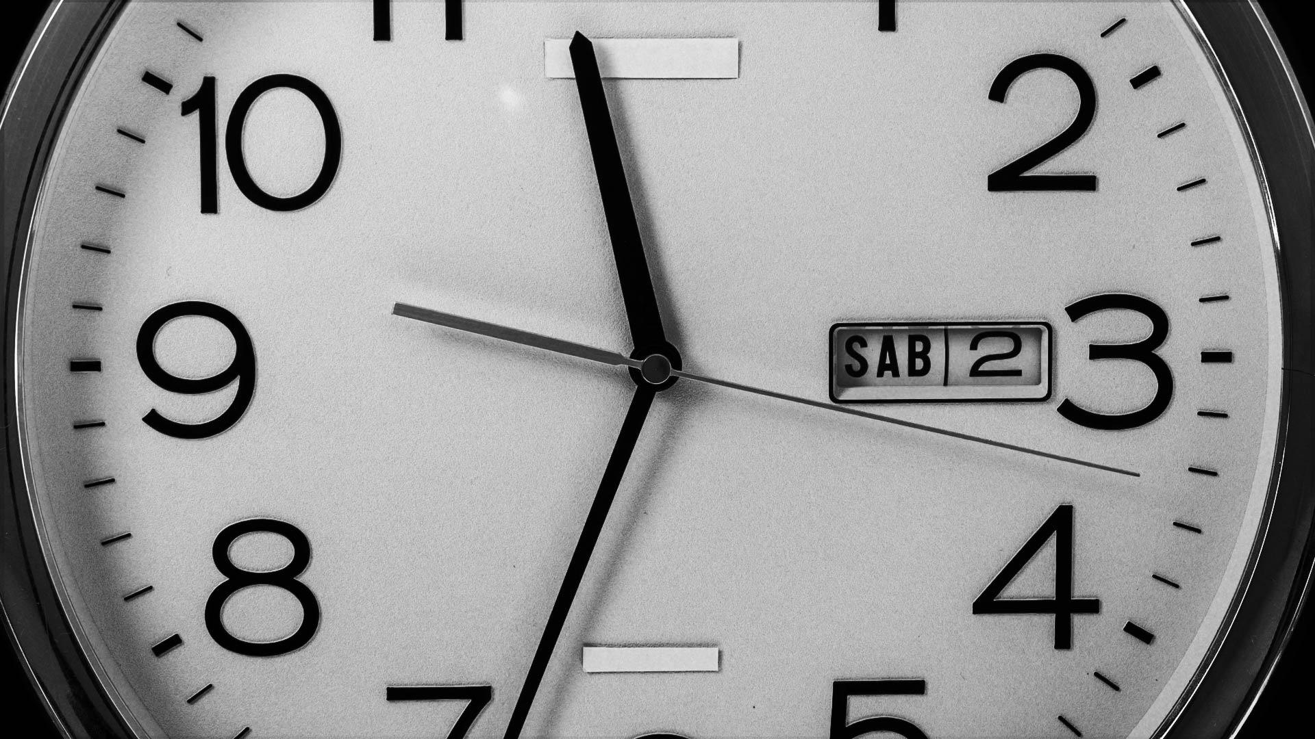 A close up of a clock face.