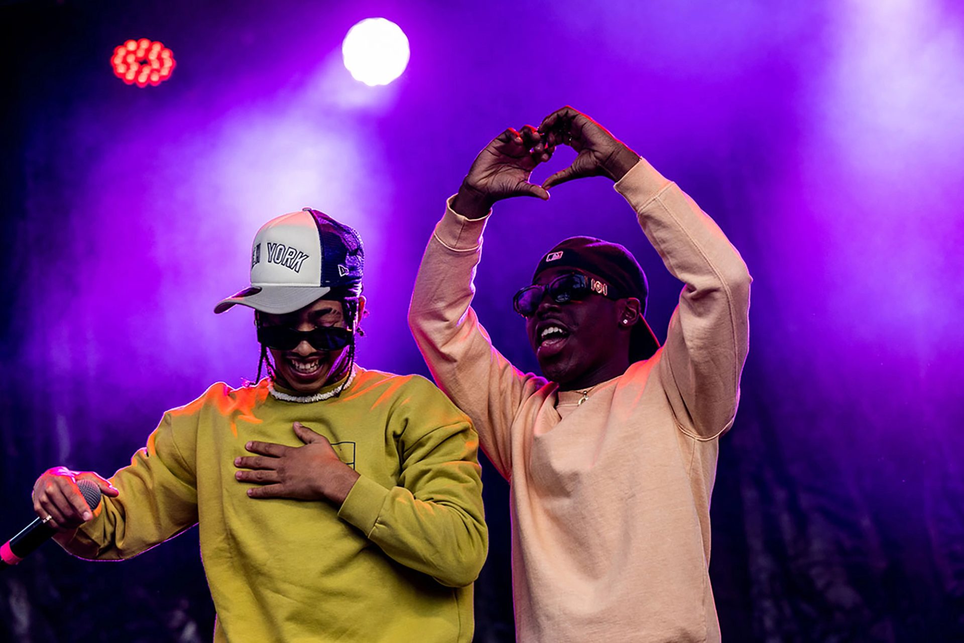 Two figures on stage.