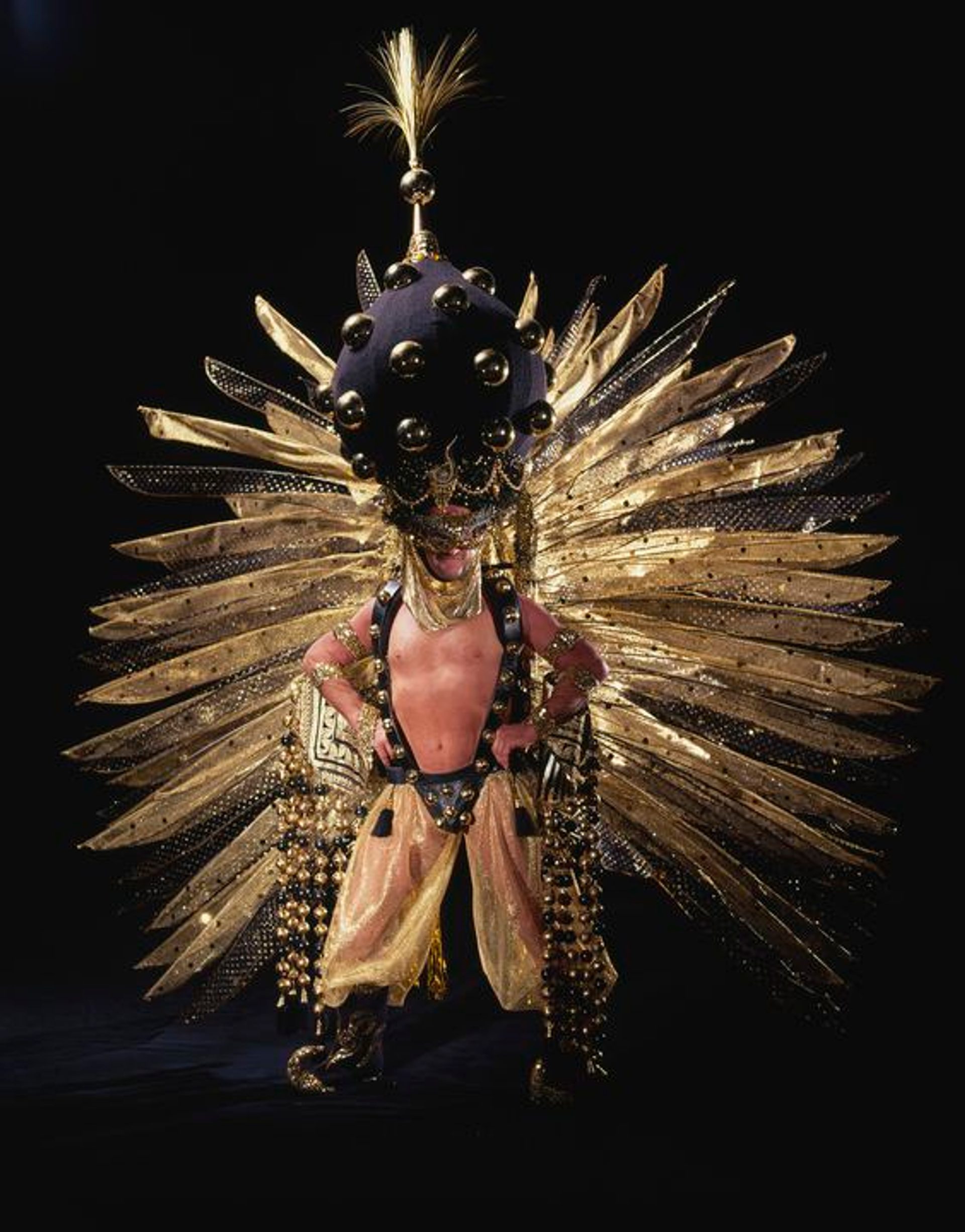 black and gold intrinsicly detailed outfit