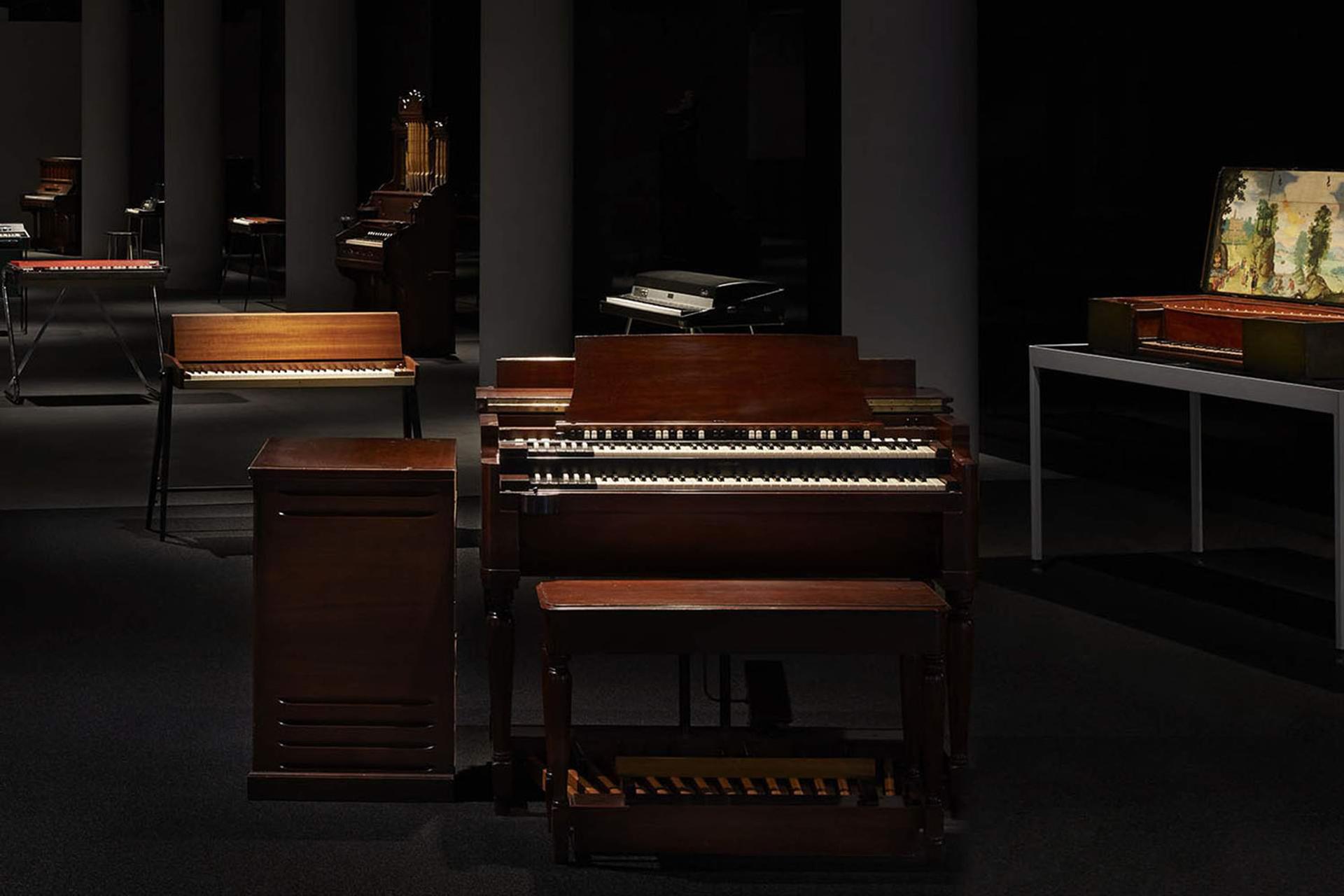View of Electric Keys showing keyboard instruments from the collection. A Hammond B3 organ from 1955 is in the foreground and the oldest keyboard instrument in the country, a Virginal from 1629, can be seen on the right. Photographed by Zan Wimberley.