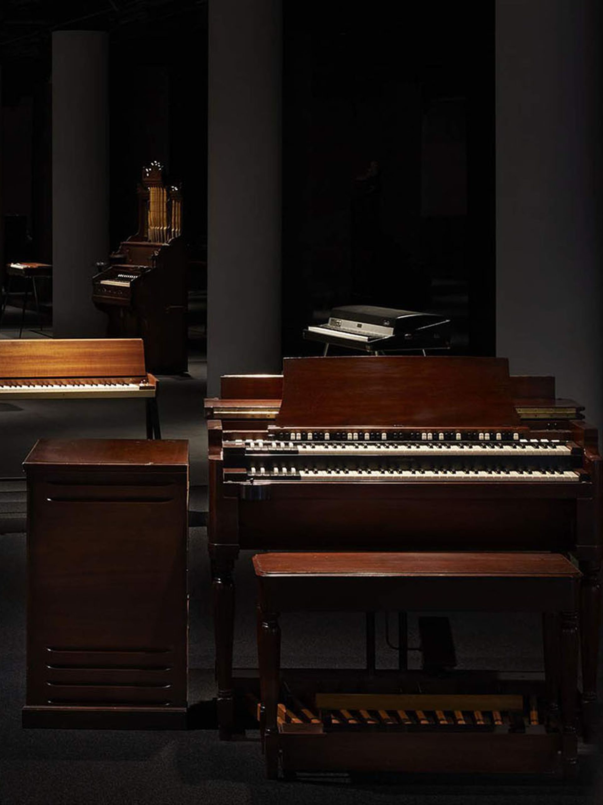 View of Electric Keys showing keyboard instruments from the collection. A Hammond B3 organ from 1955 is in the foreground and the oldest keyboard instrument in the country, a Virginal from 1629, can be seen on the right. Photographed by Zan Wimberley.
