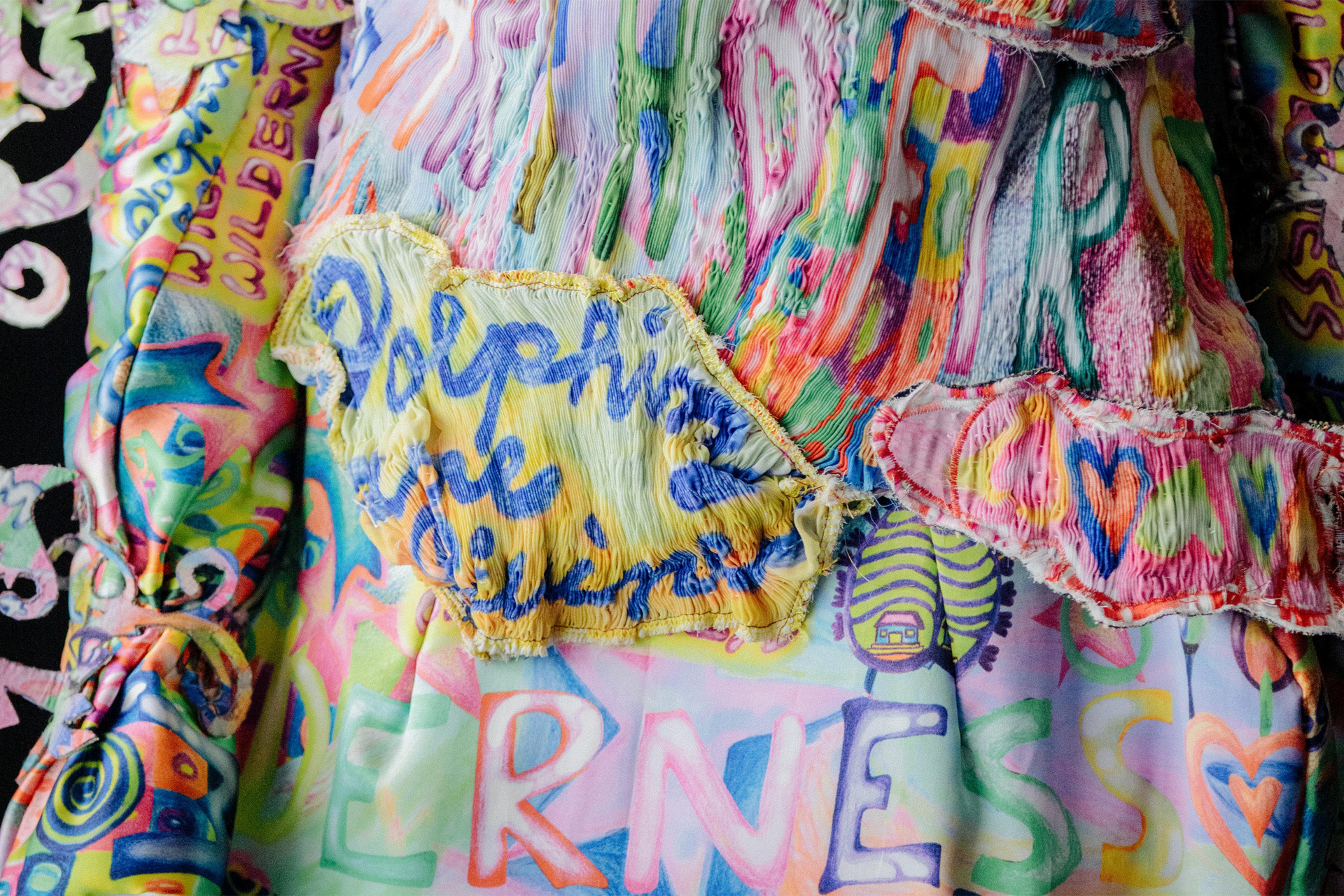 Close up image of a vibrant piece of patchwork fabric.