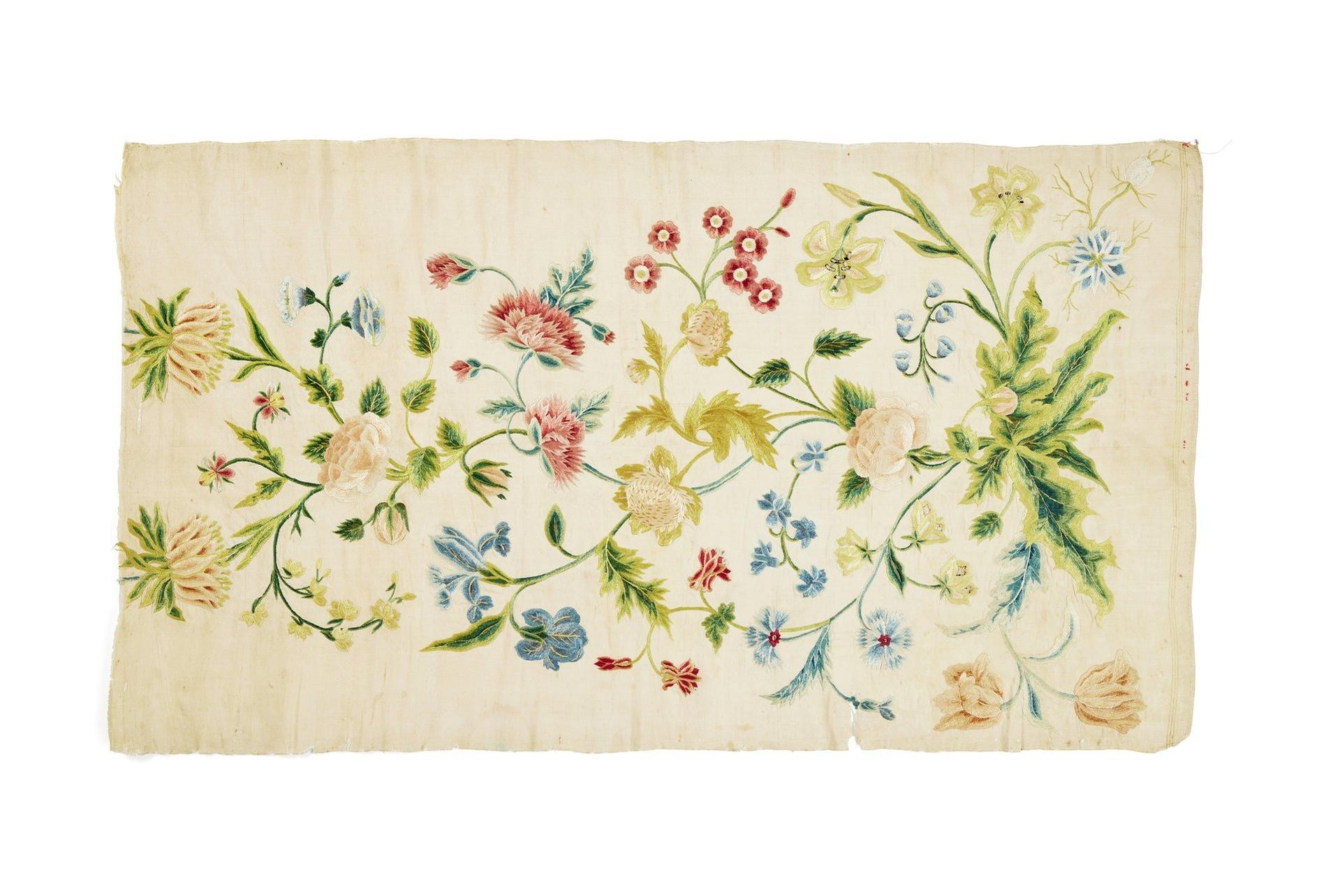 Panel of embroidery with pink, red and blue flower designs