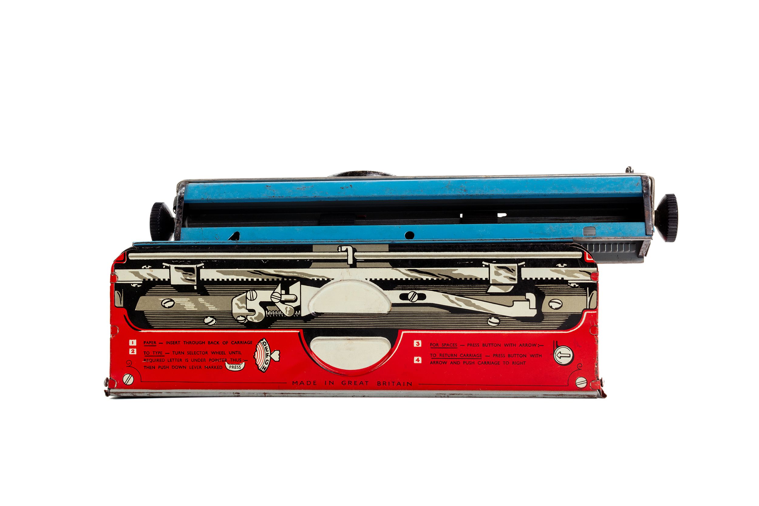 A tin plate red and blue toy typewriter.