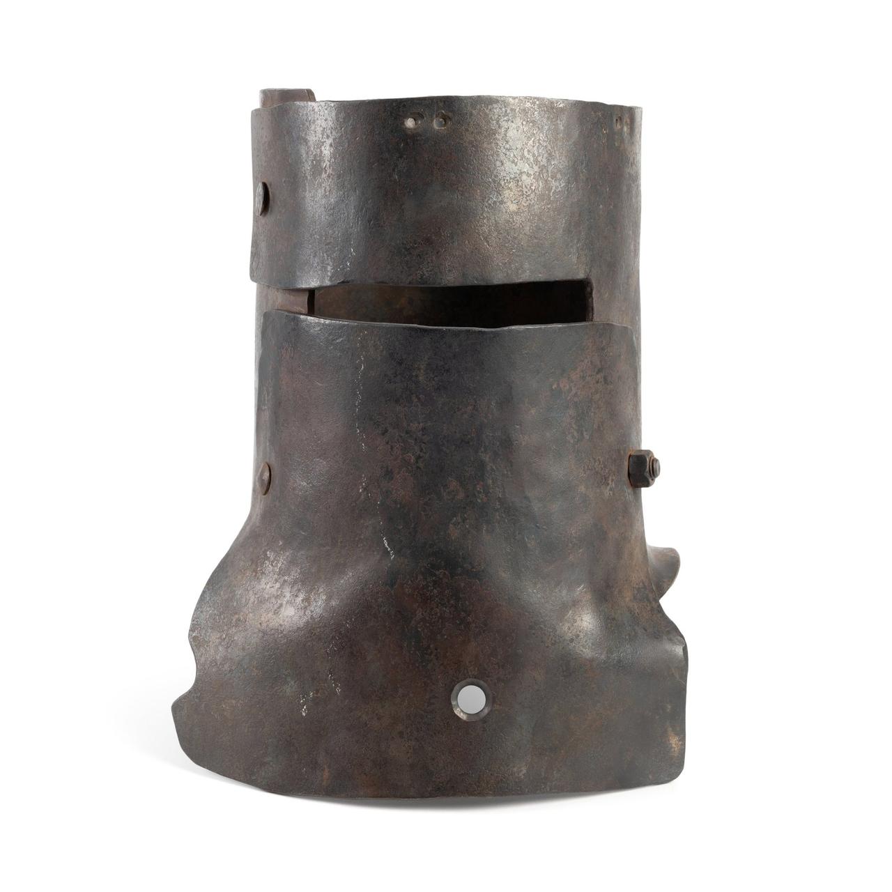 Metal costume helmet with an eye slit made to look rusty.