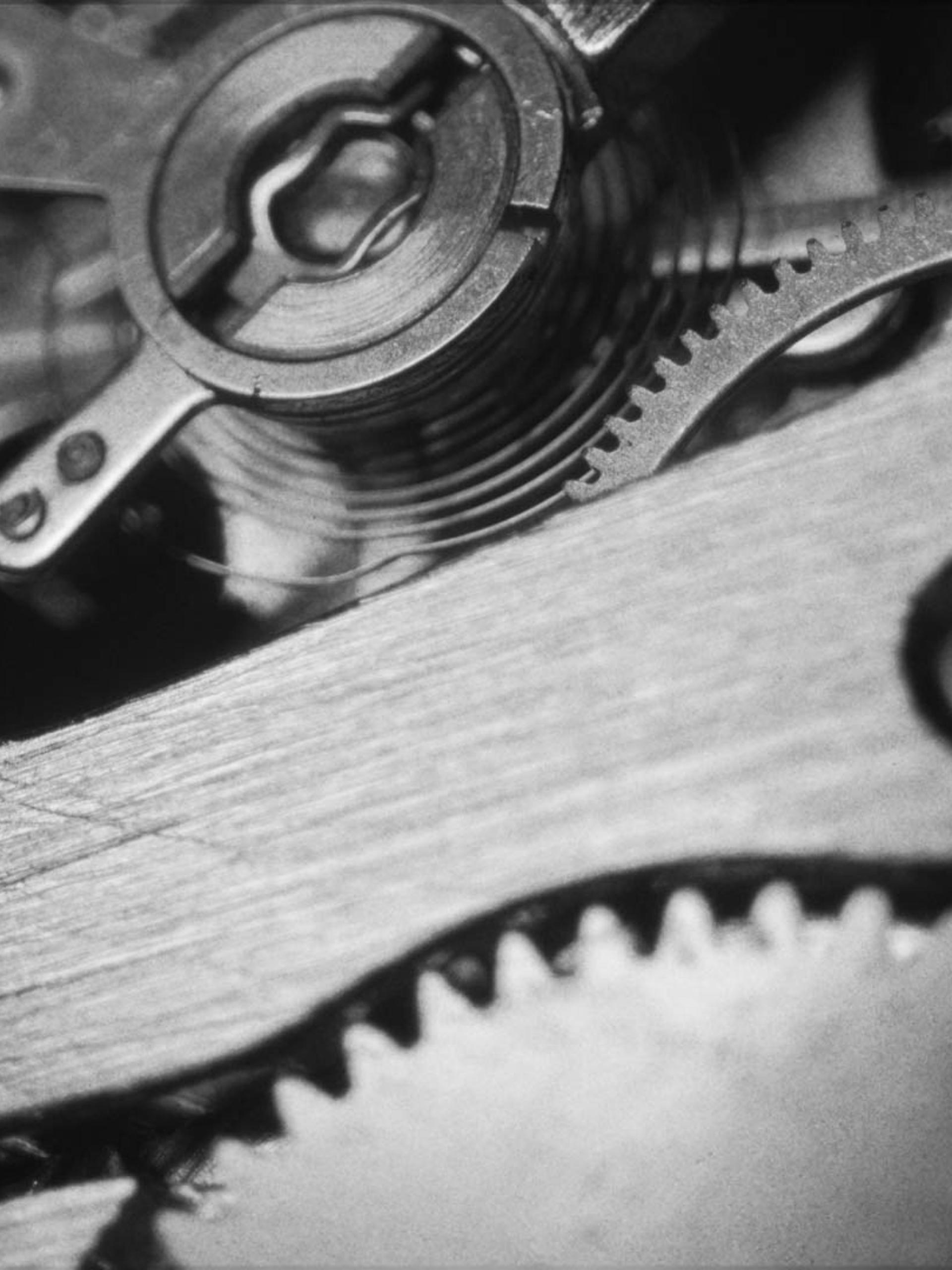 Closeup of a clocks inner workings.