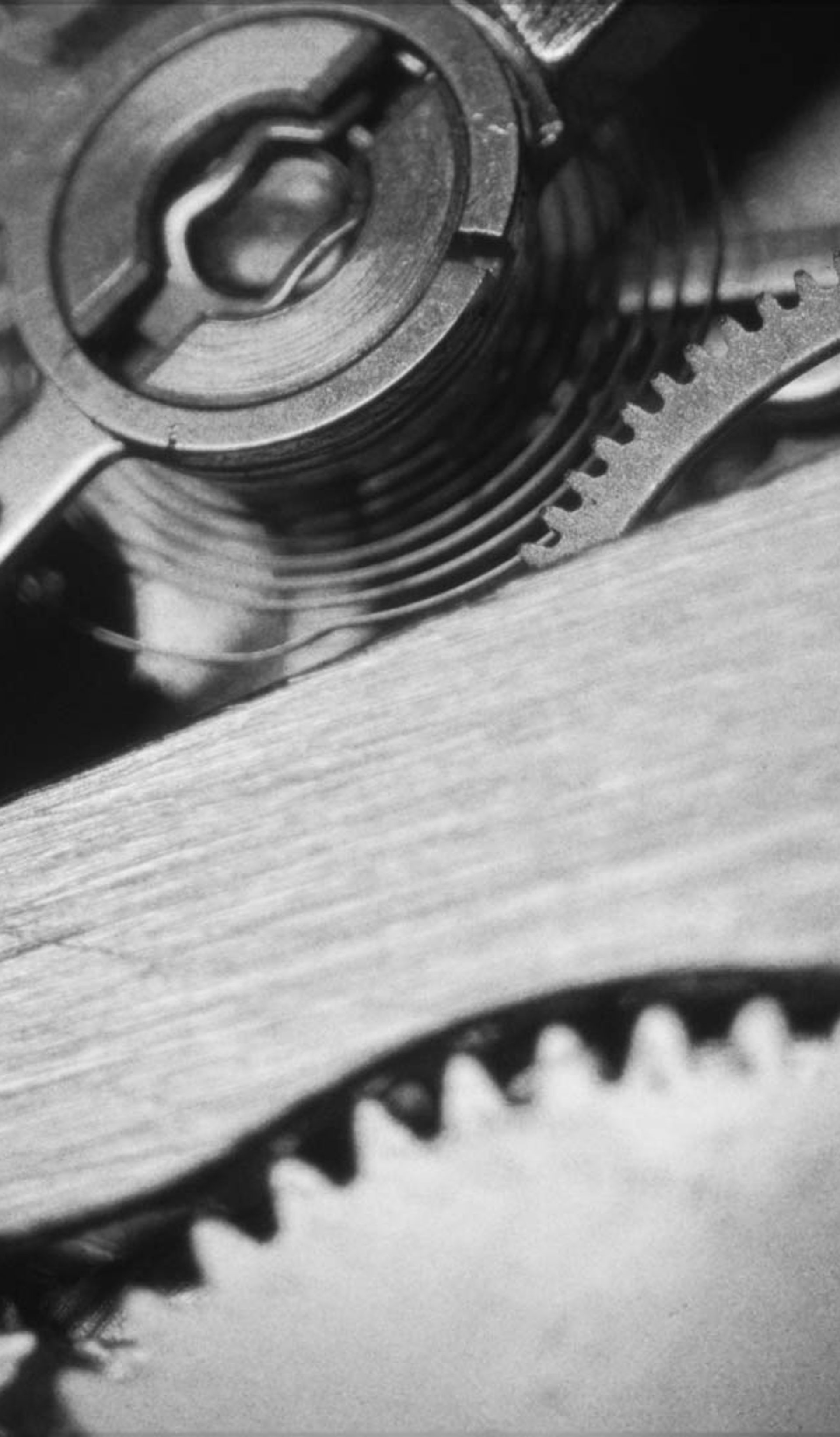 Closeup of a clocks inner workings.