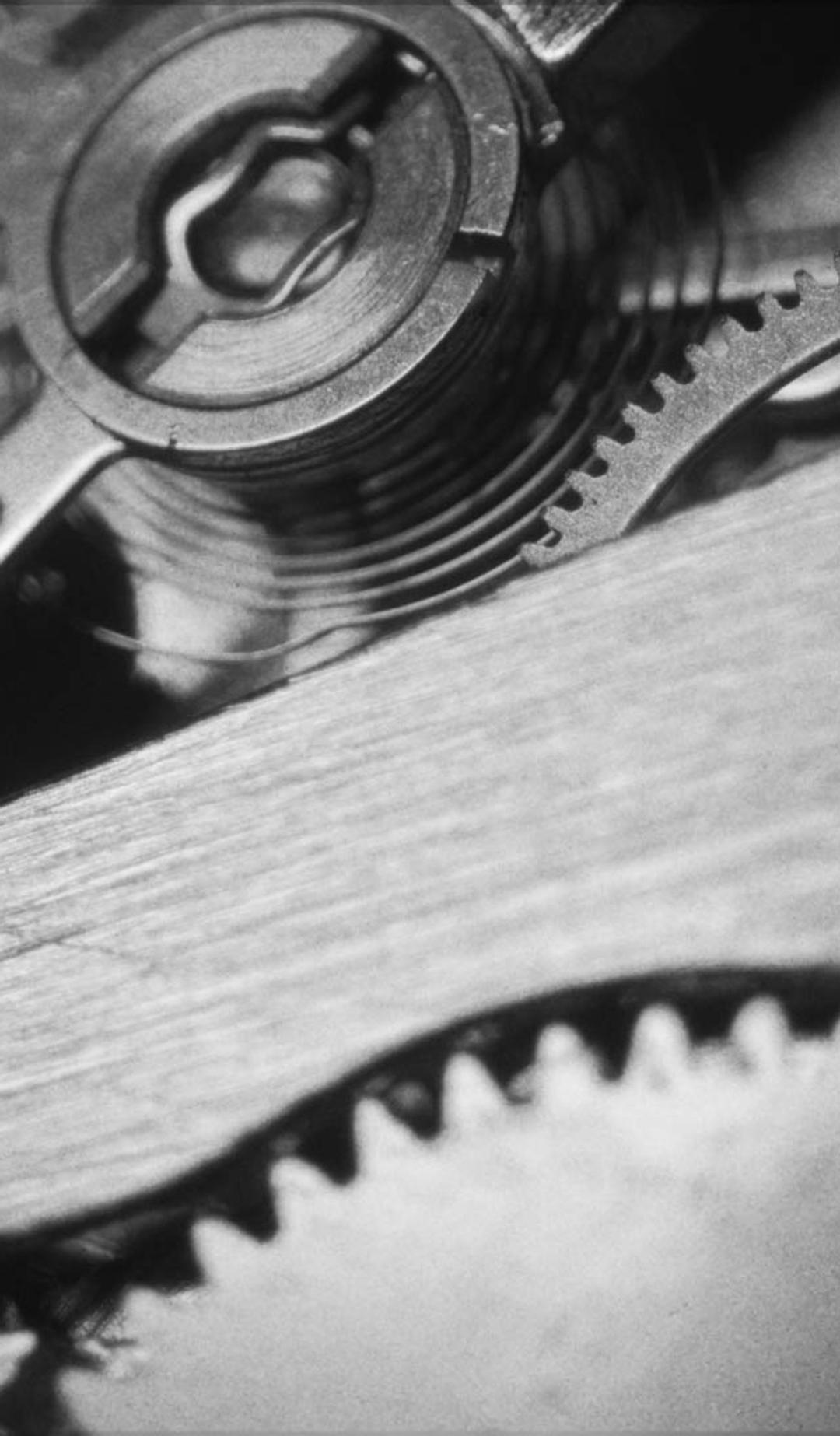 Closeup of a clocks inner workings.