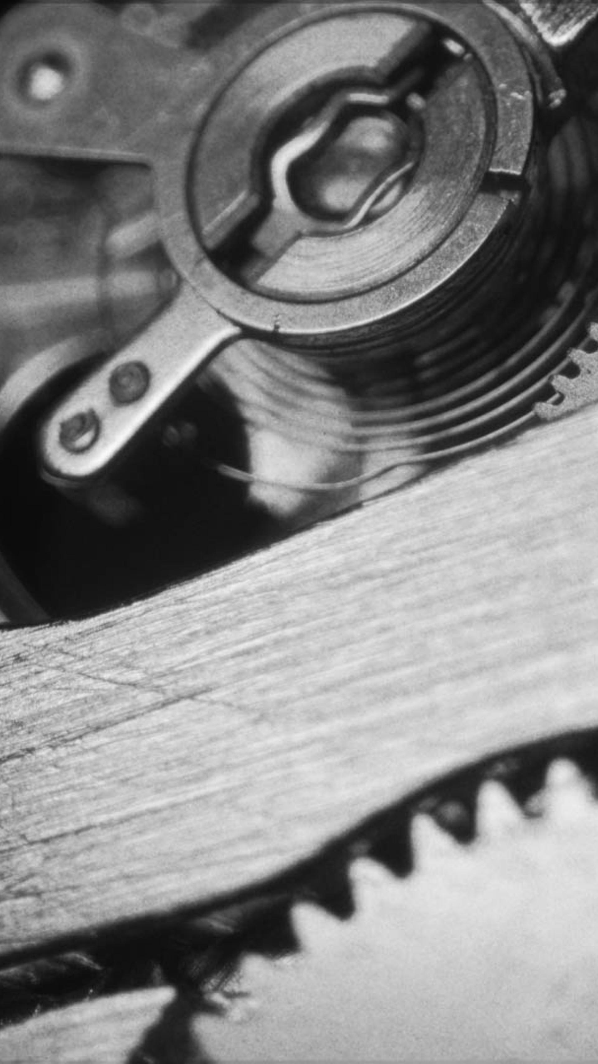 Closeup of a clocks inner workings.