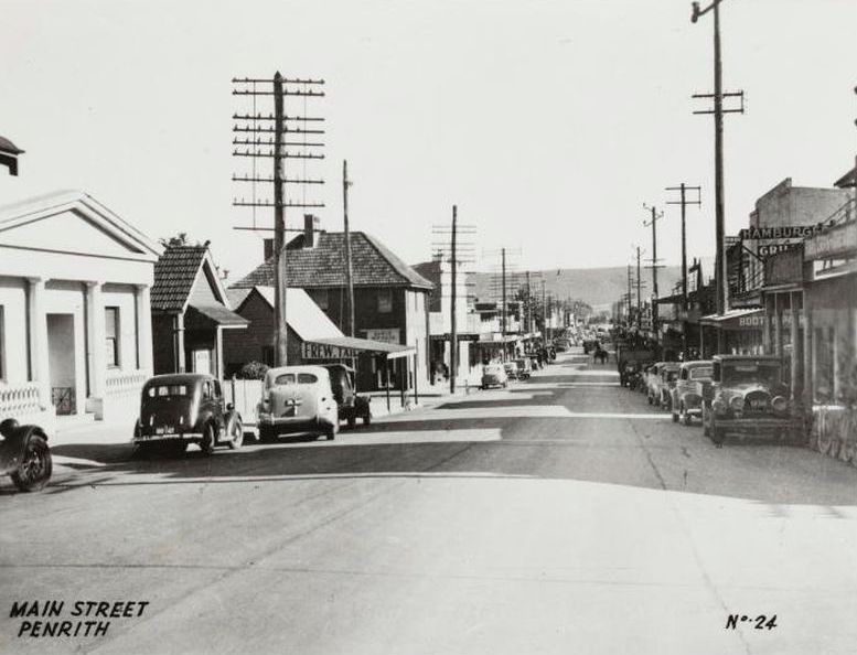 Landscape-format black and white photographic print of Main Street, Penrith, New South Wales.