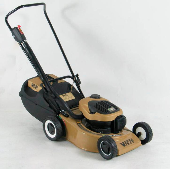 lawn mower with combined mulcher and grass catcher in black and brown
