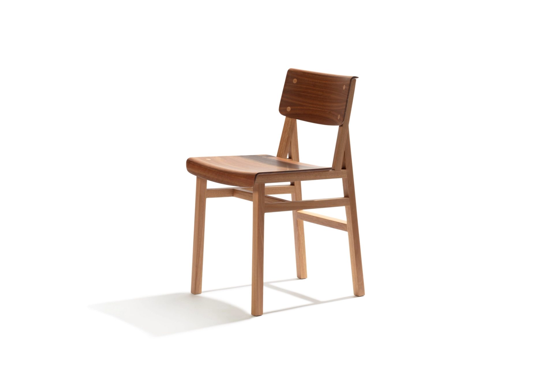 Wooden chair in studio.