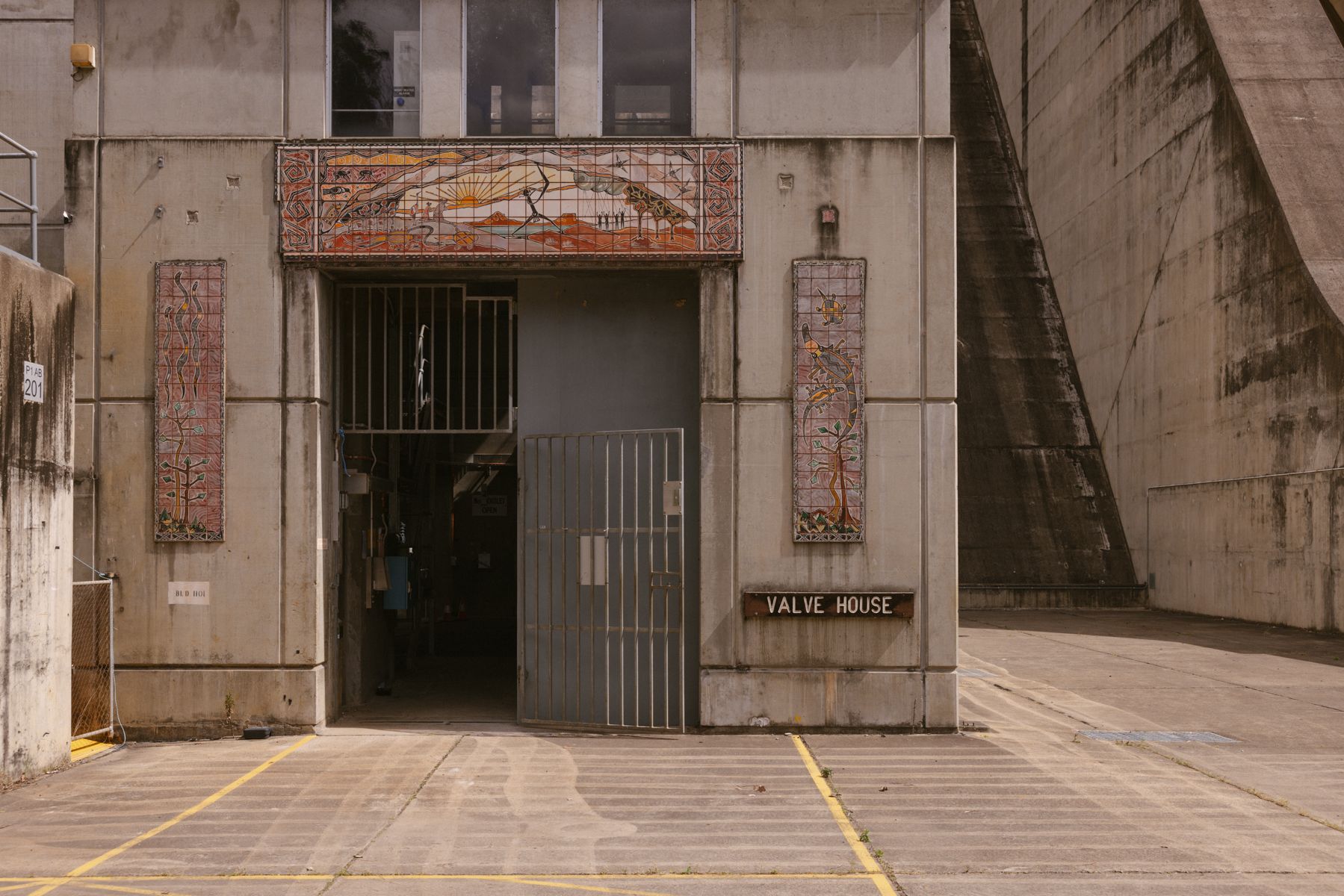 Valve Hose labelled doorway with artworks on the wall