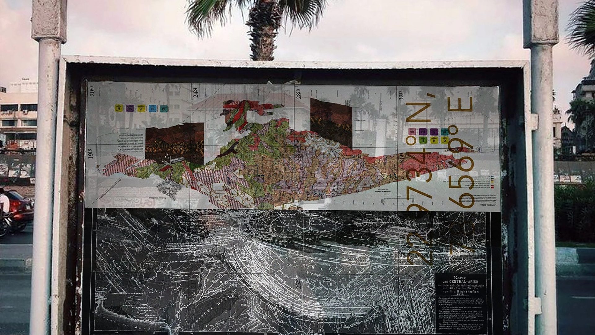 Abstract map depicting origins of popular dishes suspended in glass between two white poles.