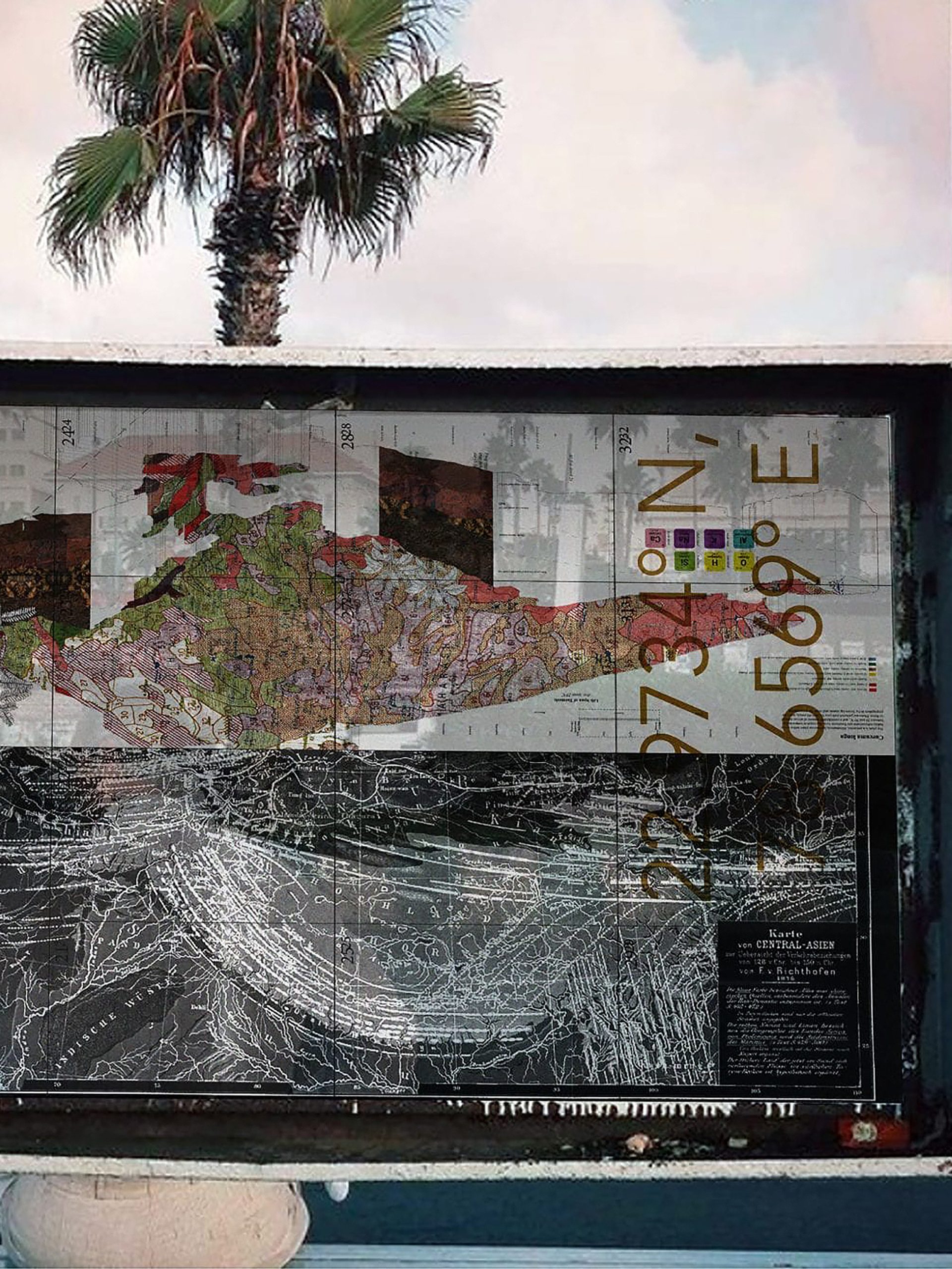Abstract map depicting origins of popular dishes suspended in glass between two white poles.