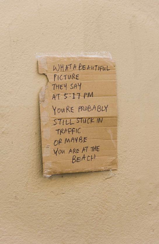 Note reading “WHAT A BEAUTIFUL PICTURE THEY SAY AT 5:17PM YOU’RE PROBABLY STILL STUCK IN TRAFFIC OR MAYBE YOU ARE AT THE BEACH”