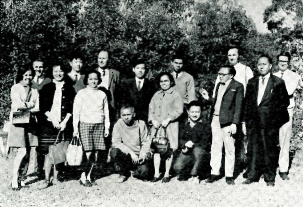Black and white photograph of a group of researchers