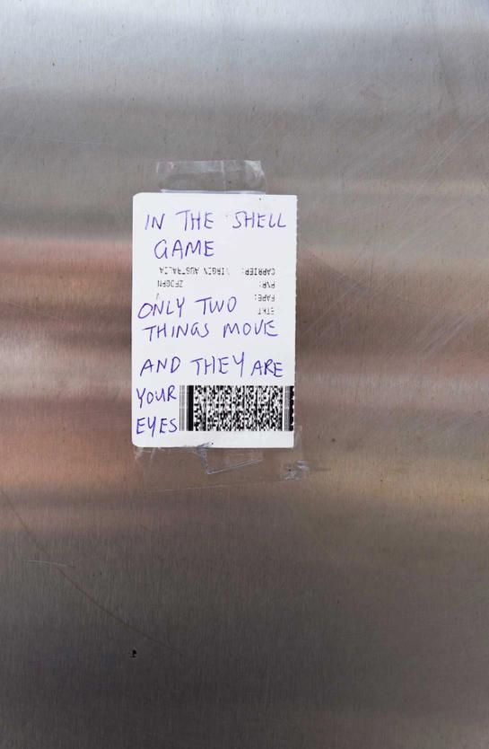 Note reading “IN THE SHELL GAME ONLY TWO THINGS MOVE AND THEY ARE YOUR EYES”