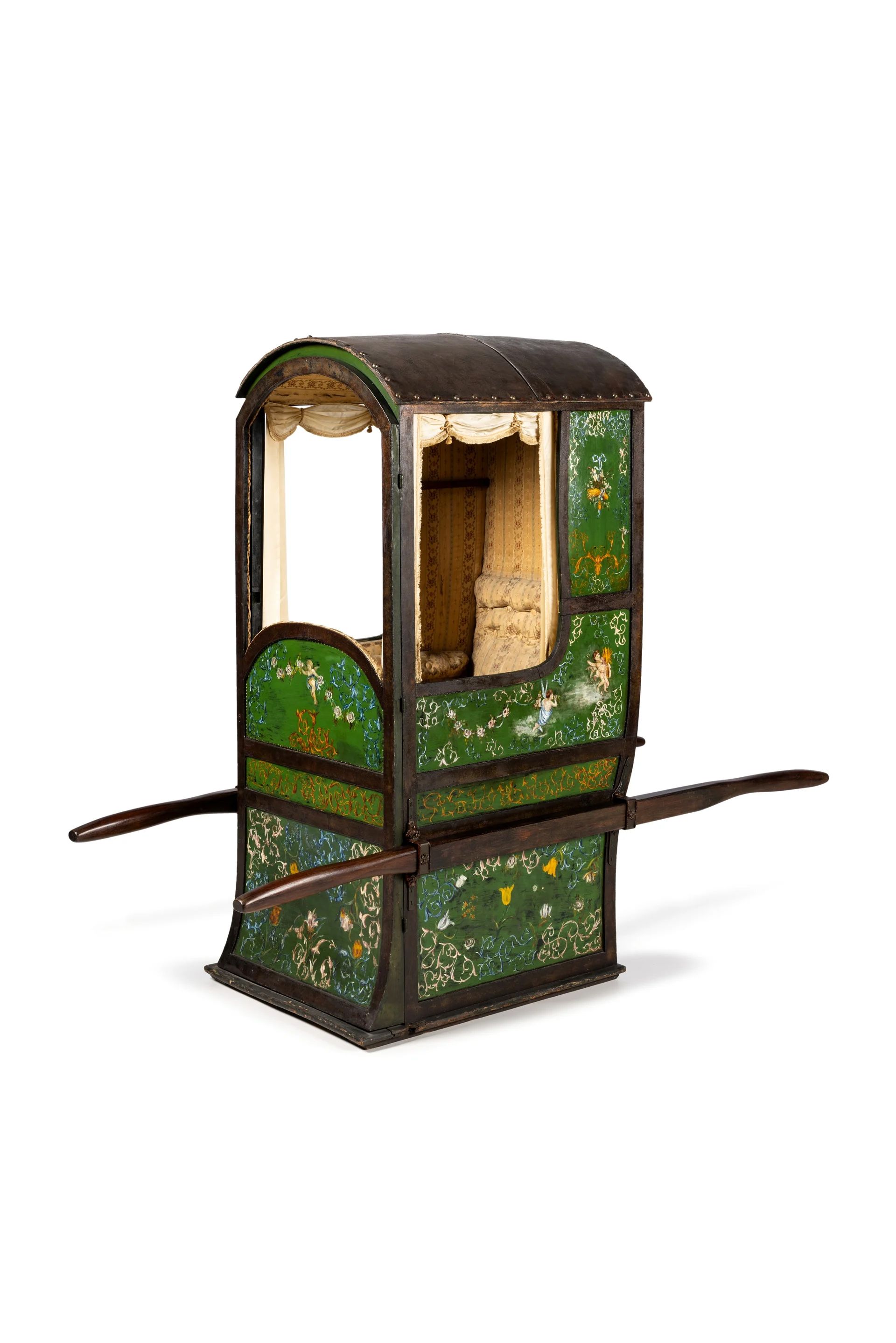 A green sedan chair with horizontal poles for carriers.