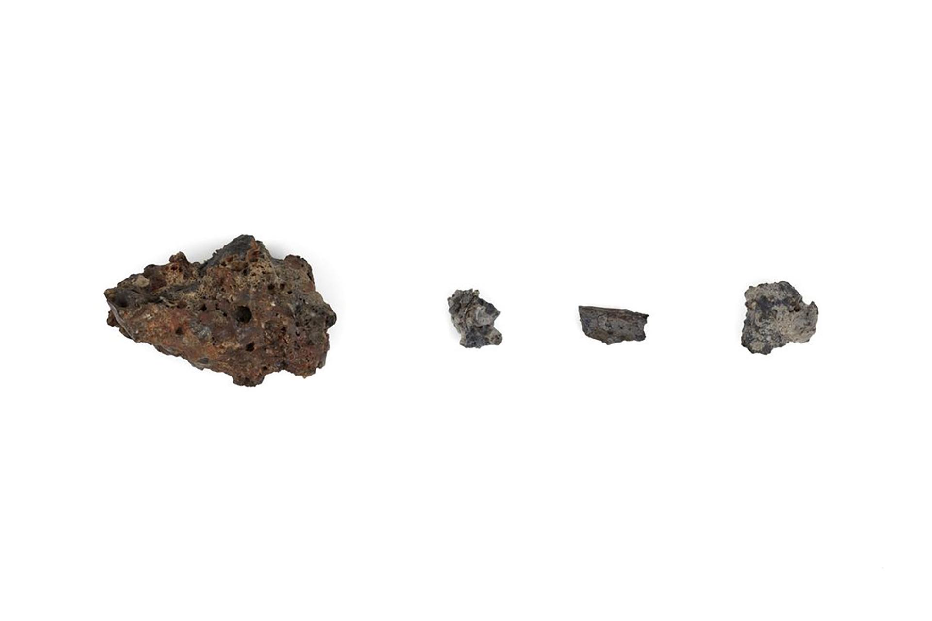 Four pieces of satellite debris