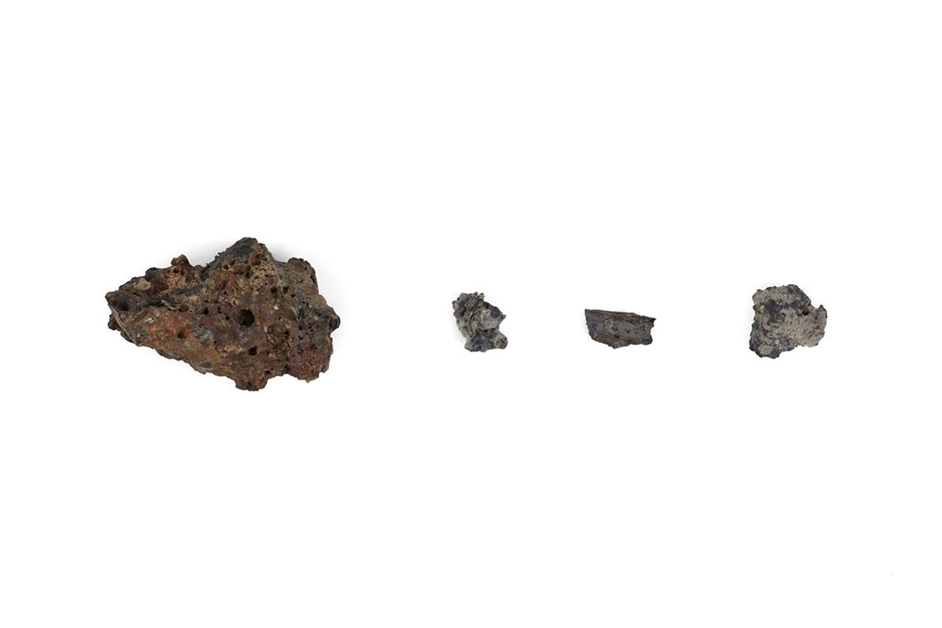 Four pieces of satellite debris