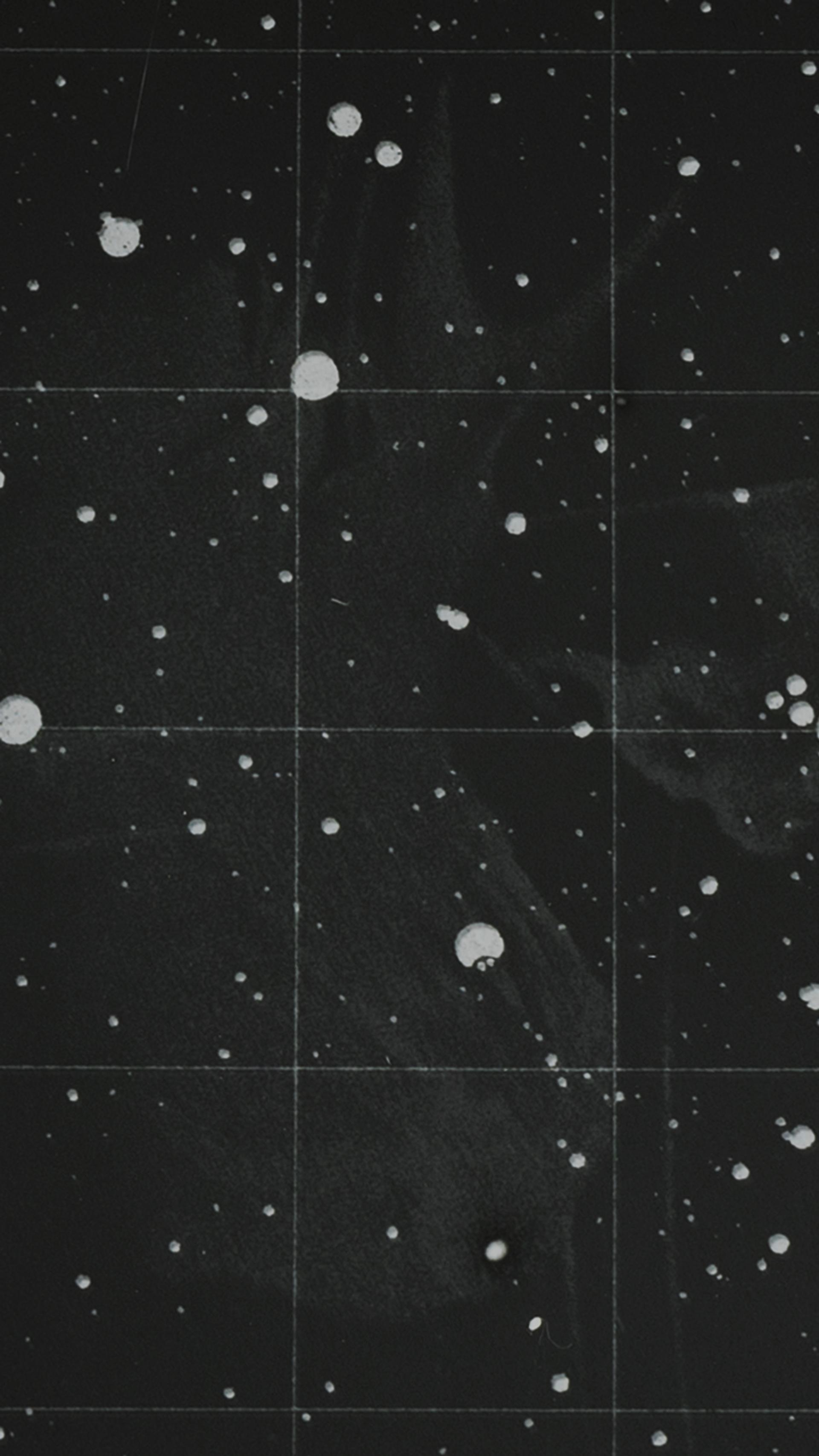 Photograph of a glass plate slide used for teaching astronomy depicting the Pleiades, a star cluster.