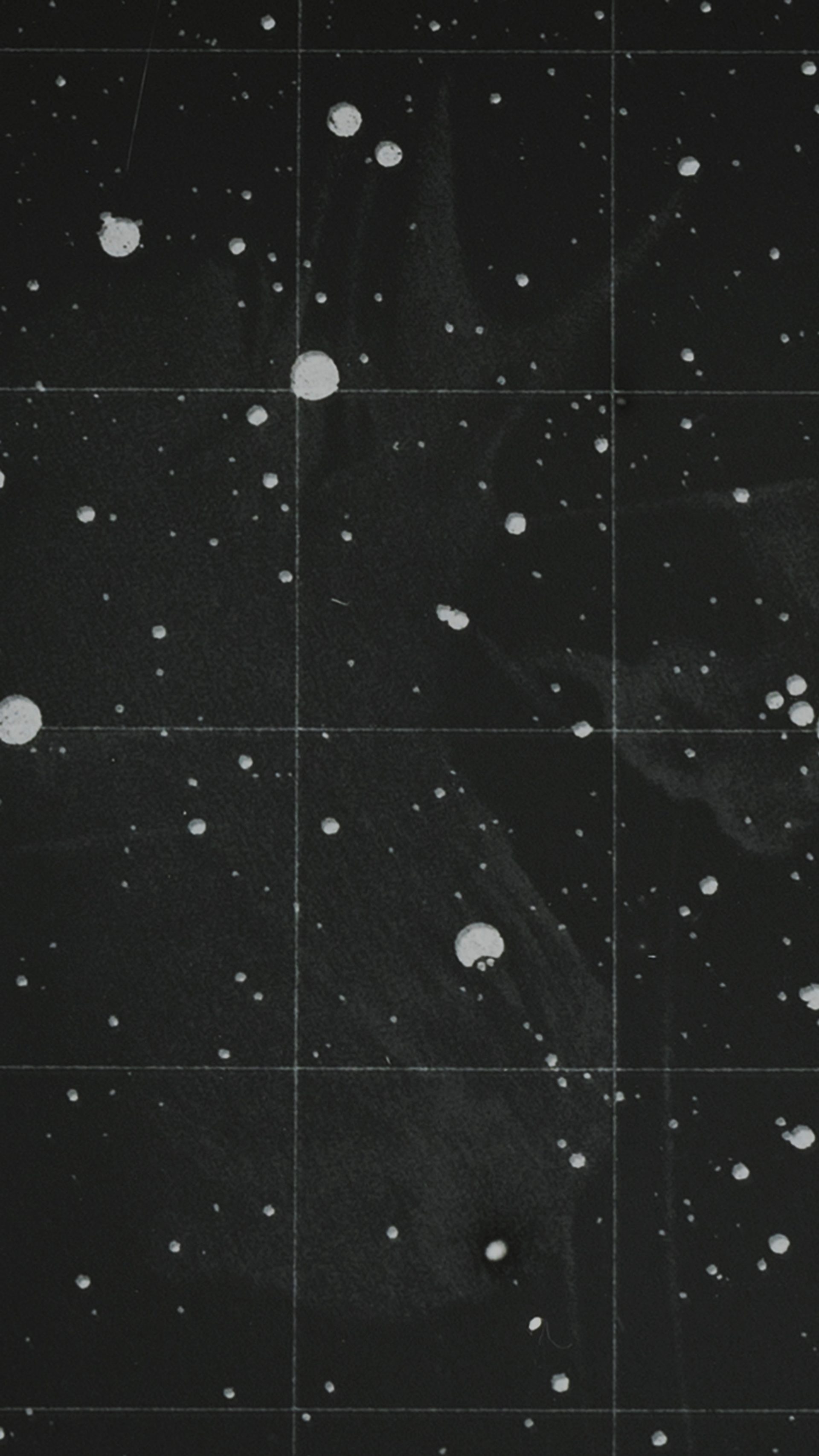Photograph of a glass plate slide used for teaching astronomy depicting the Pleiades, a star cluster.