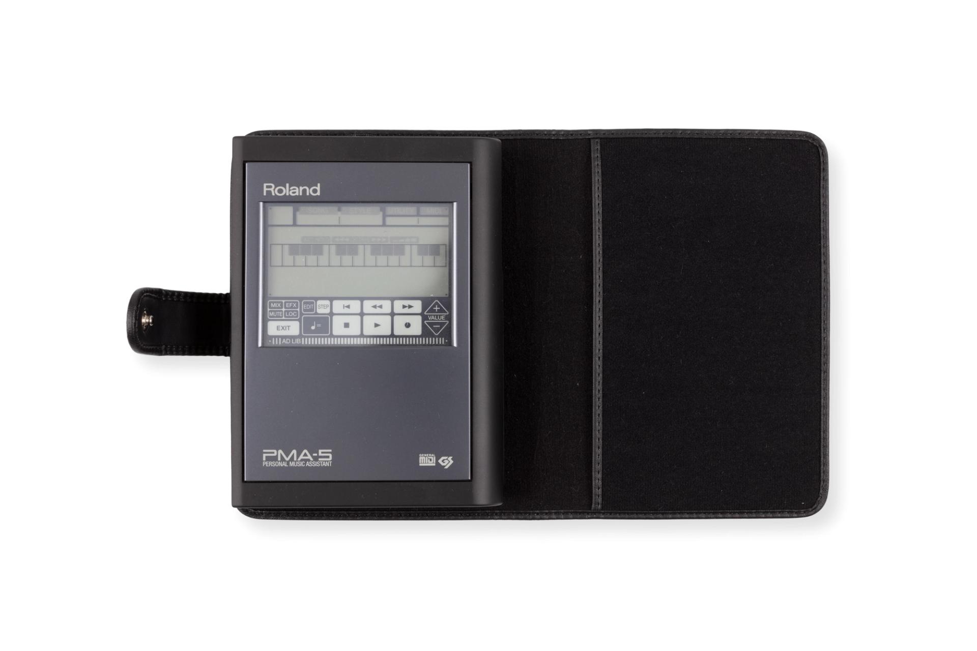 The PMA5 resembles a late 20th century electronic notepad or a Filofax. A black vinyl cover opens to reveal a hard plastic cased device with a display screen taking up half of the PMA5 front surface. A stylus (mounted in the case when not in use) is used on a touch sensitive screen to operate prompts and commands.